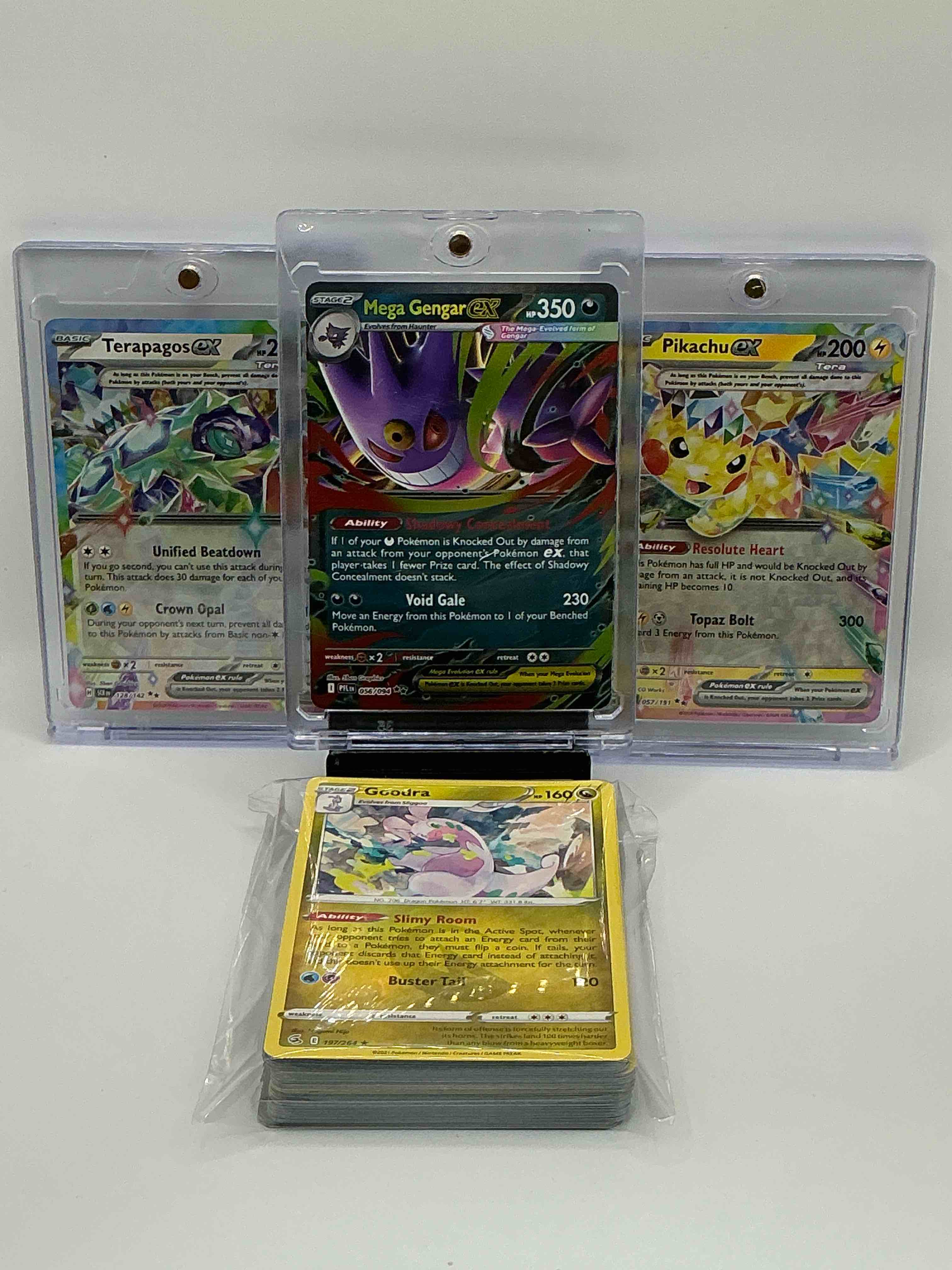 Pokémon Palooza! Silver Blast Shadowy Concealment Void Gate Mega Gengar EX! Silver Shimmer Unified Beatdown Crown Opal Terapagos EX! Silver Color-Blast Resolute Heart Topaz Bolt! Along With 50 Other Pokémon Heroes, Legends & Commons!