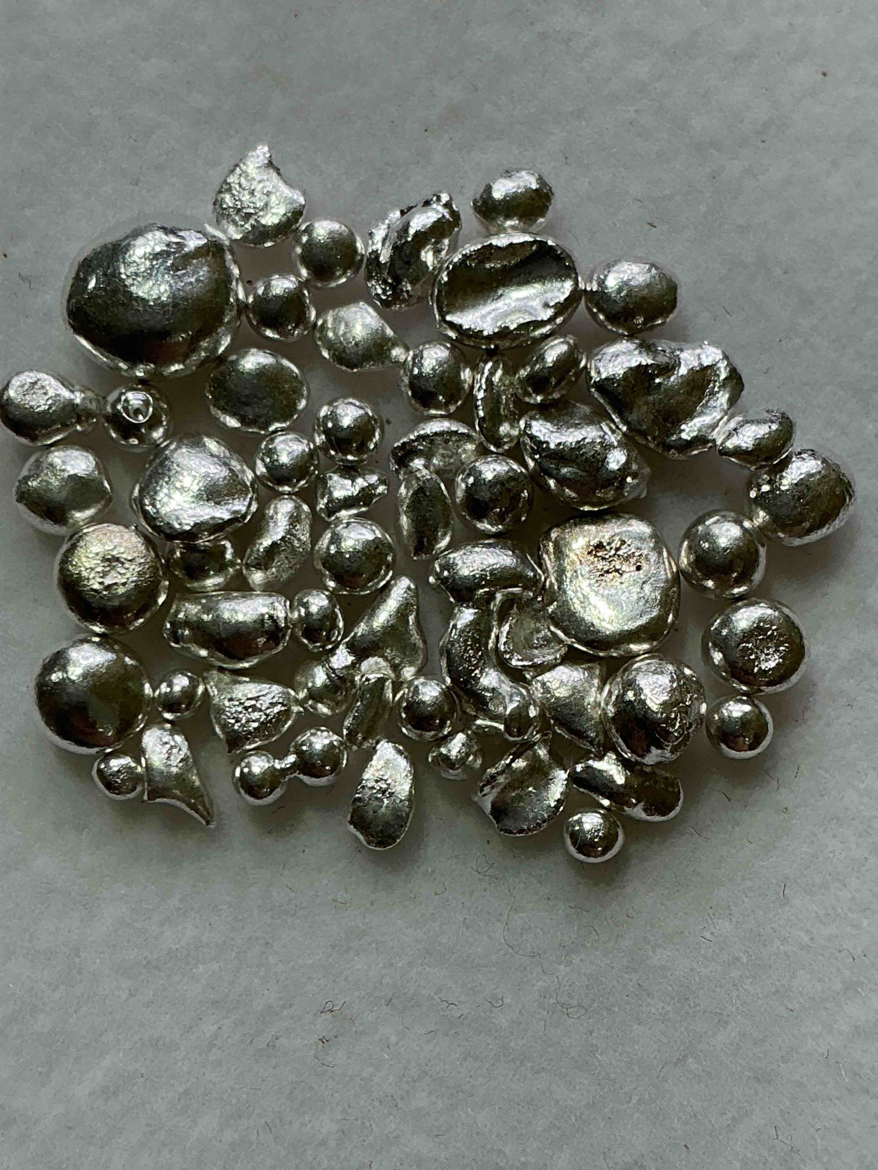 Silver Nuggets! .999 US Fine Silver, In Small Nugget Form! Total Weight Of All Nuggets In Lot Approximately 9 Grams, Bid Is Per Nugget! A Cool Way To Invest In Fine US Silver! Includes Collector Capsule!