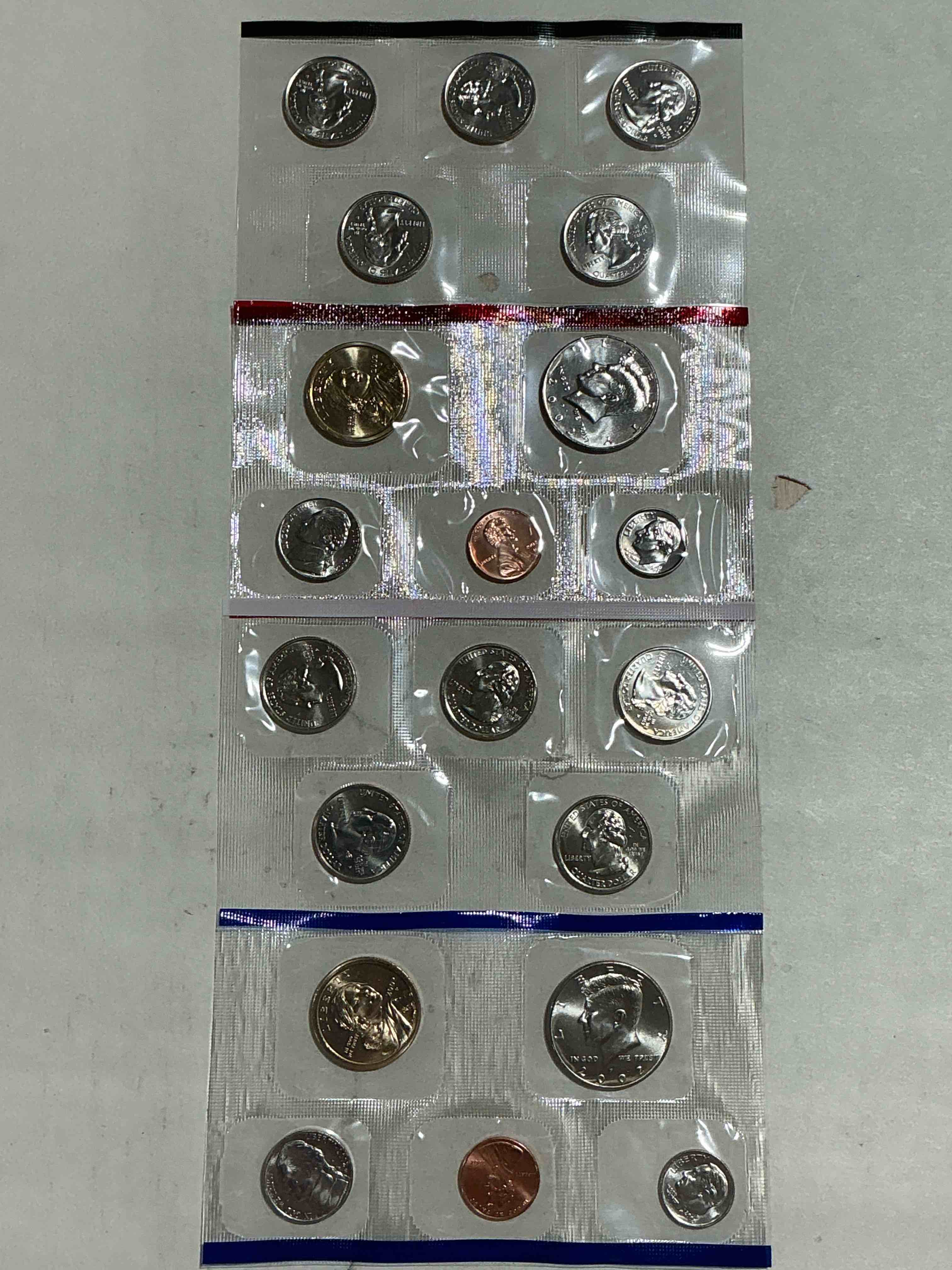2002 uncirculated mint coins! 20 coin mint coins with state quarters! half dollars, one dollar coins, quarters, nickels, dimes & pennies! 20 coin uncirculated mint coins! 