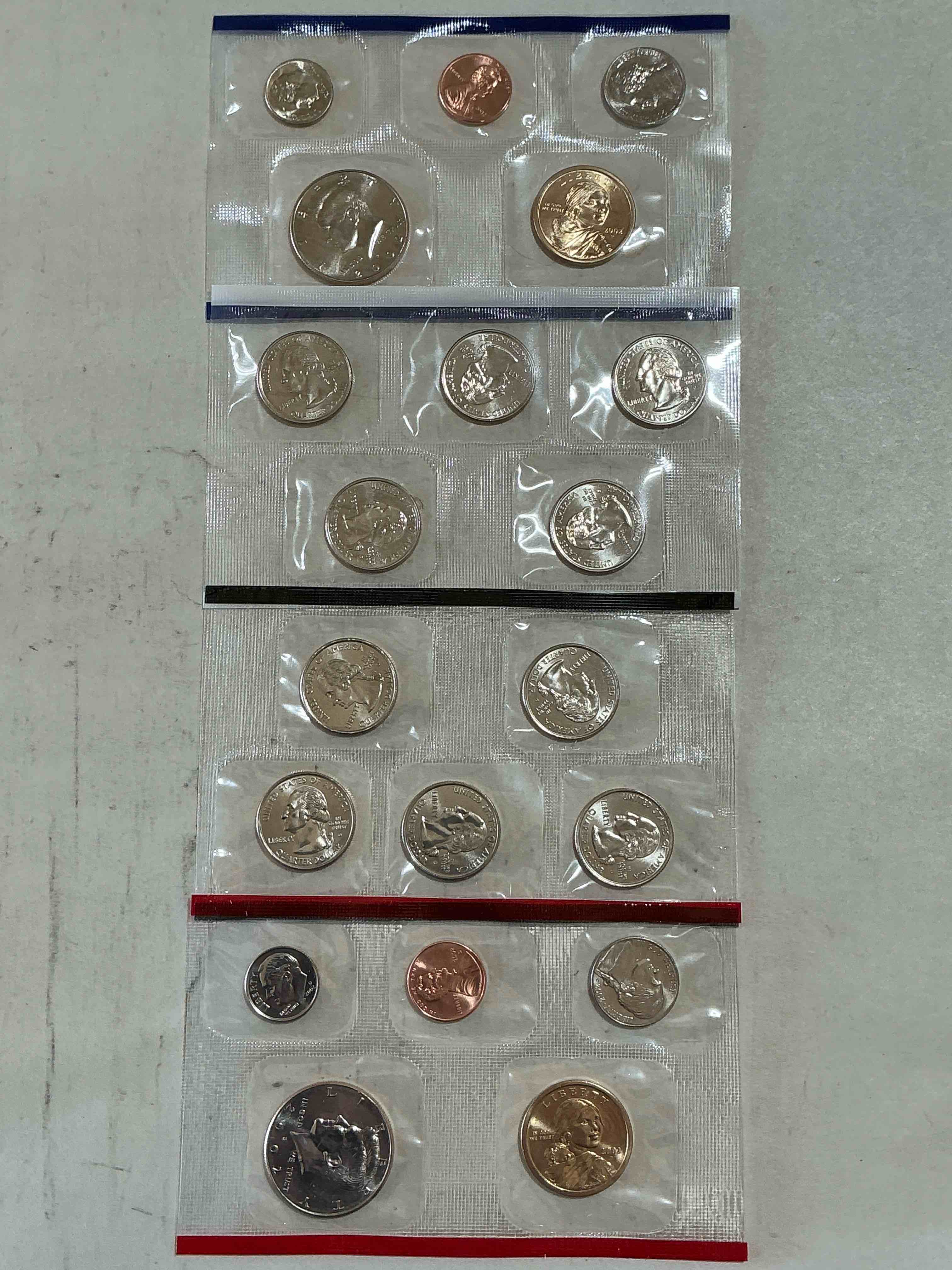 2002 uncirculated mint coins! 20 coin mint coins with state quarters! half dollars, one dollar coins, quarters, nickels, dimes & pennies! 20 coin uncirculated mint coins! 