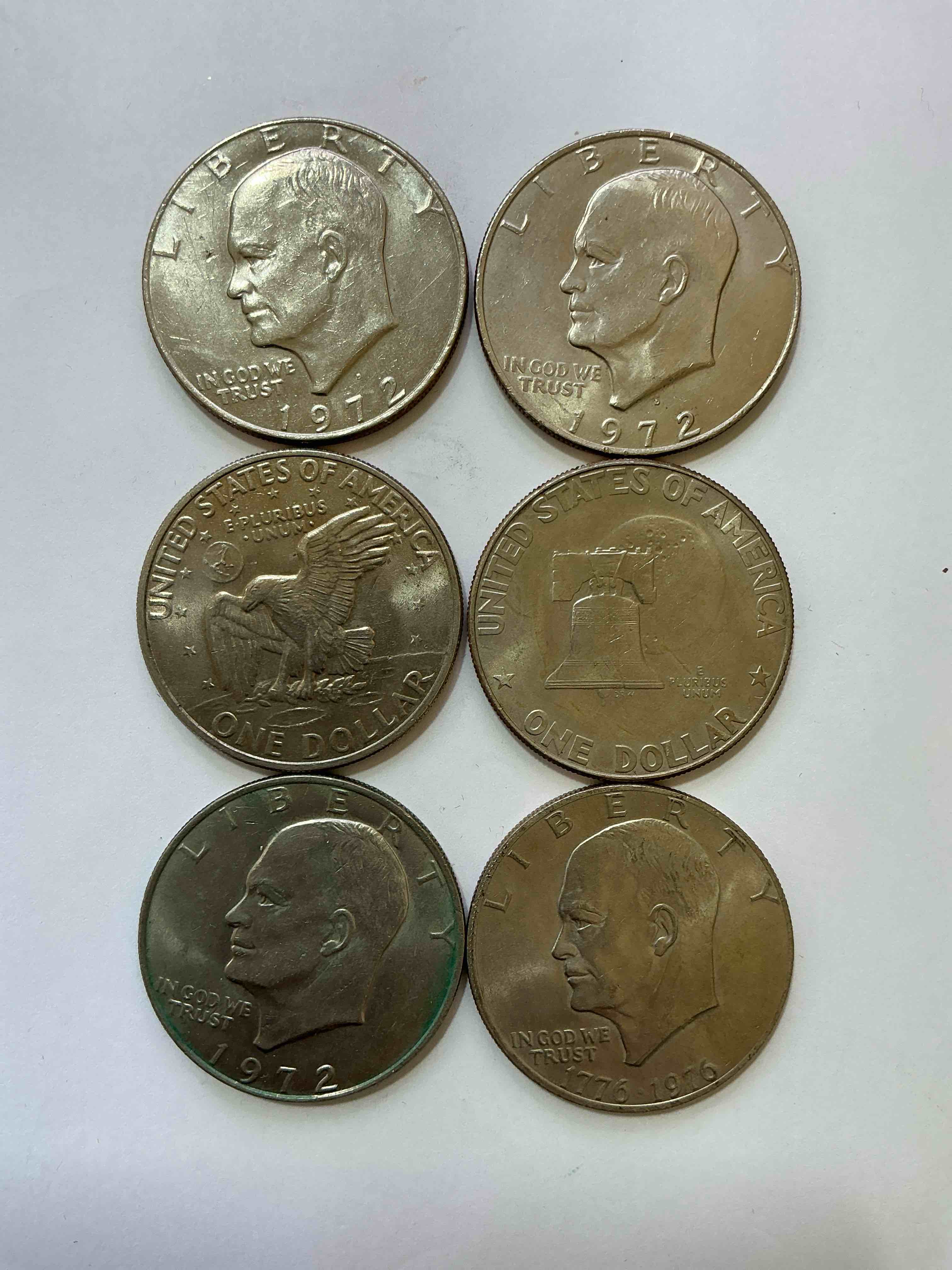 Condition photo showing Good Condition for Gorgeous Eisenhower Dollar Coins! These Striking, Large U.S. Coins Were Minted From 1971-1978. Here Are Gorgeous Examples Of “Ike" Dollars From 1976 & Other Years! These Coins Have Become Immensely Popular With Collectors & Some Have Great Toning!