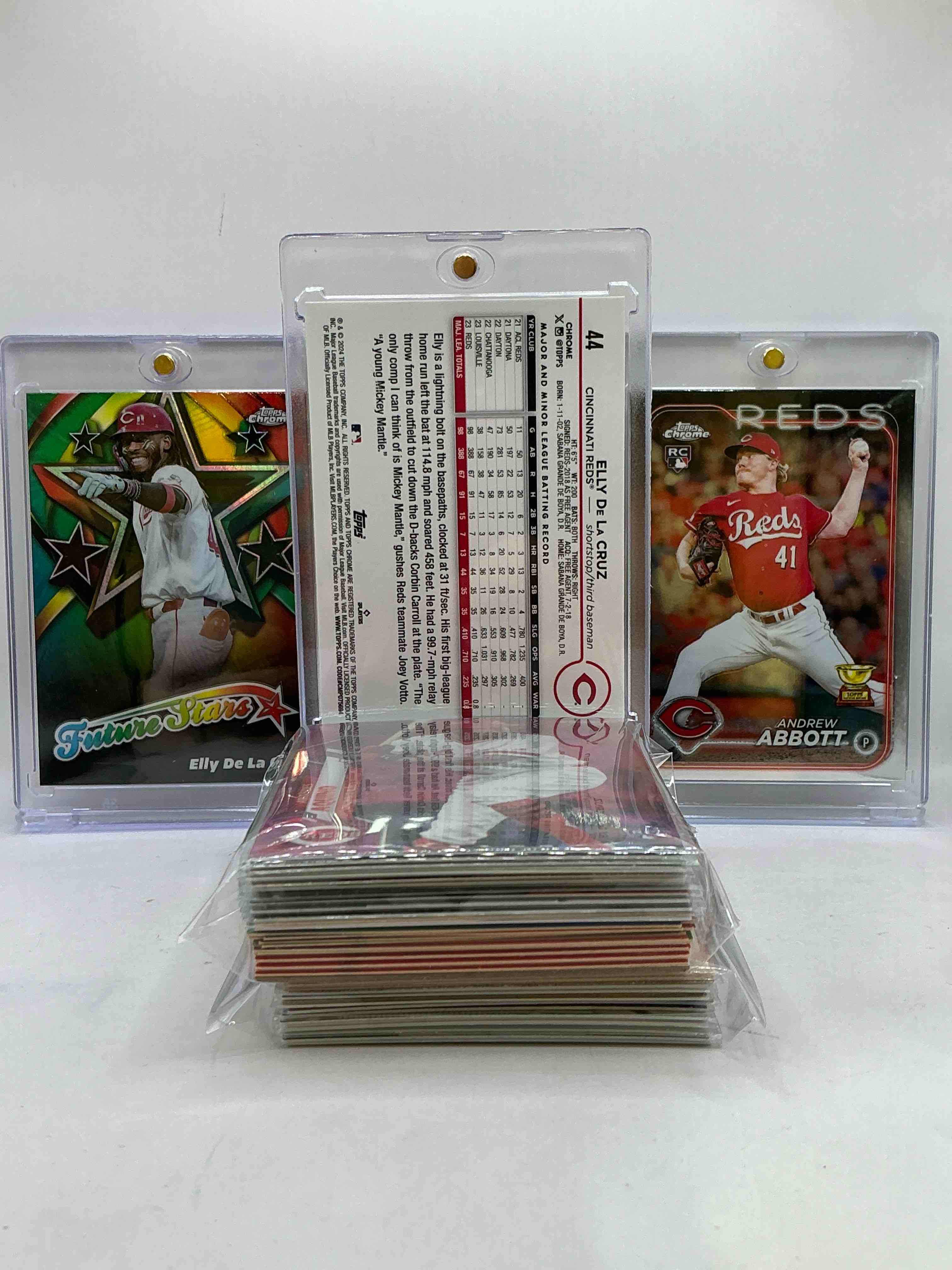 Condition photo showing New/Like New for Elly De La Cruz Topps Chrome Rookie, Andrew Abbott Matching Topps Chrome Rookie, Topps Chrome Elly De La Cruz Future Stars & More! Reds Lot! 50 Card Lot, Includes Commons, Legends, Heroes, Rookies & More! Wow!