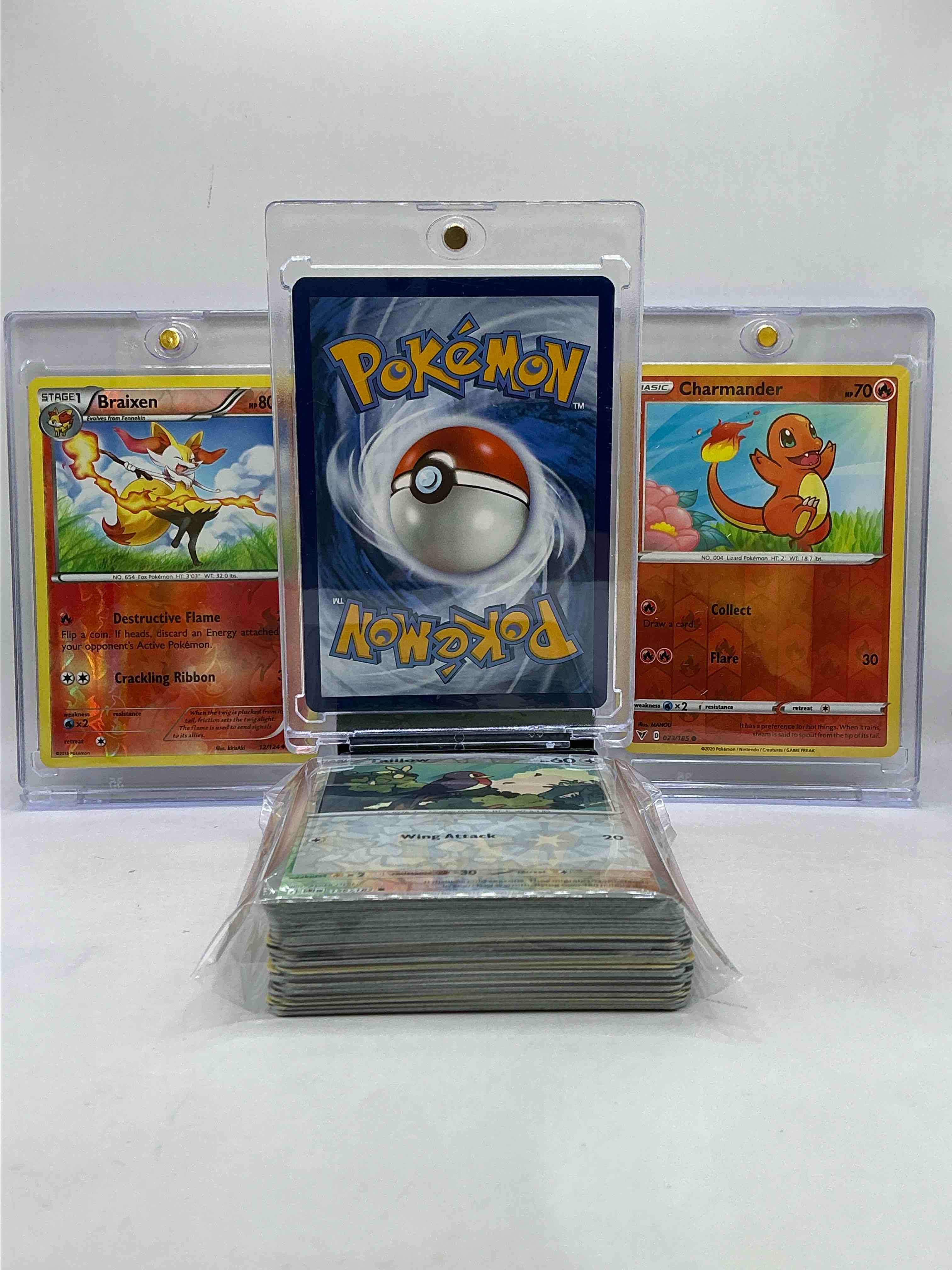 Condition photo showing New/Like New for Pikachu Holo, Braixen Holo & Charmander WOW! Insane Trio! This 50 Card Lot Includes Commons, Legends, Heroes & More! Pokémon Palooza! 