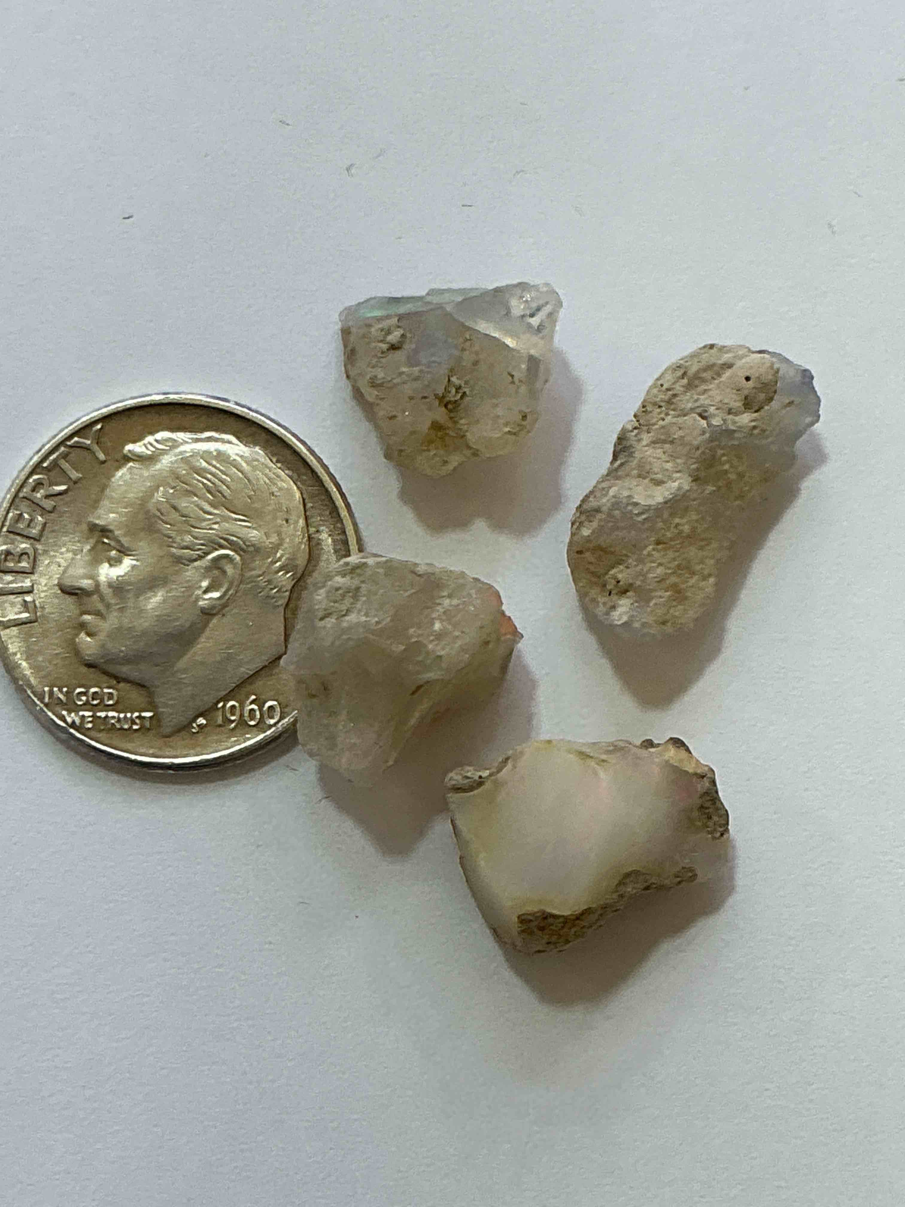 Condition photo showing New/Like New for Opal Precious Gemstone, Raw, Authentic! Ethiopian Opal Gemstone, In Large & Raw, Prospected Form! Ethiopian Opals Are Famous For Their Stunning Clarity & Shimmering Color Hues! They Are Believed To Promote Hope, Purity & Love. The U.S. Dime In Image Is For Size Reference Only (Not Included). A Gemstone Like This In Raw Form Is Very Hard To Find! Own An Amazing, Stunning, Unique Opal Gemstone In Rare, Raw Form!