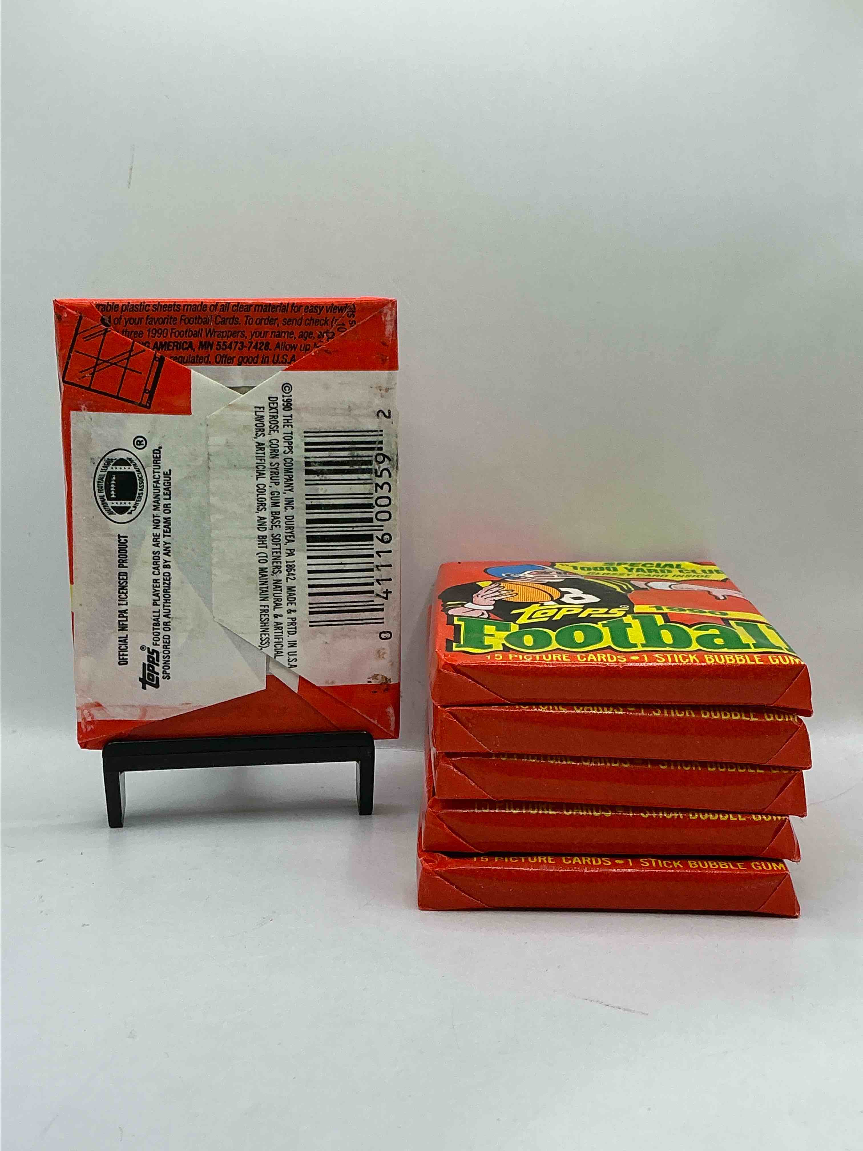 Condition photo showing New/Like New for The Last Year Of Football Wax! Joe Montana, Emmitt Smith & Barry Sanders!? 1990 Topps Football Unopened Sports Card Wax Pack, Direct From Original Retail Box! Getting Hard To Find! Search For Early Barry Sanders & Jerry Rice & So Much More!