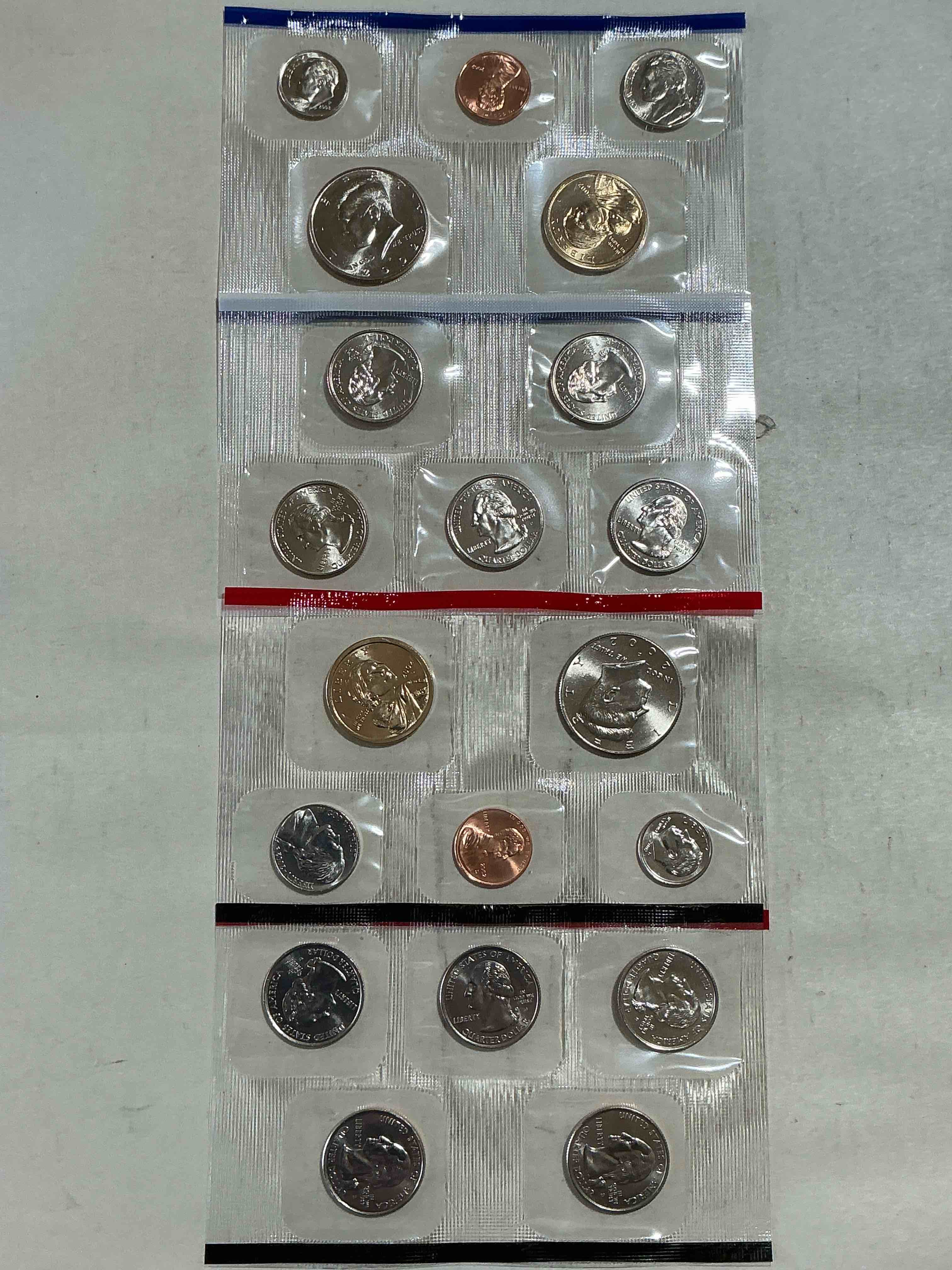 2002 uncirculated mint coins! 20 coins from philadelphia & denver! 20 coin uncirculated lot, with state quarters, nickels, half dollars, dimes, pennies & more! uncirculated coin craziness!