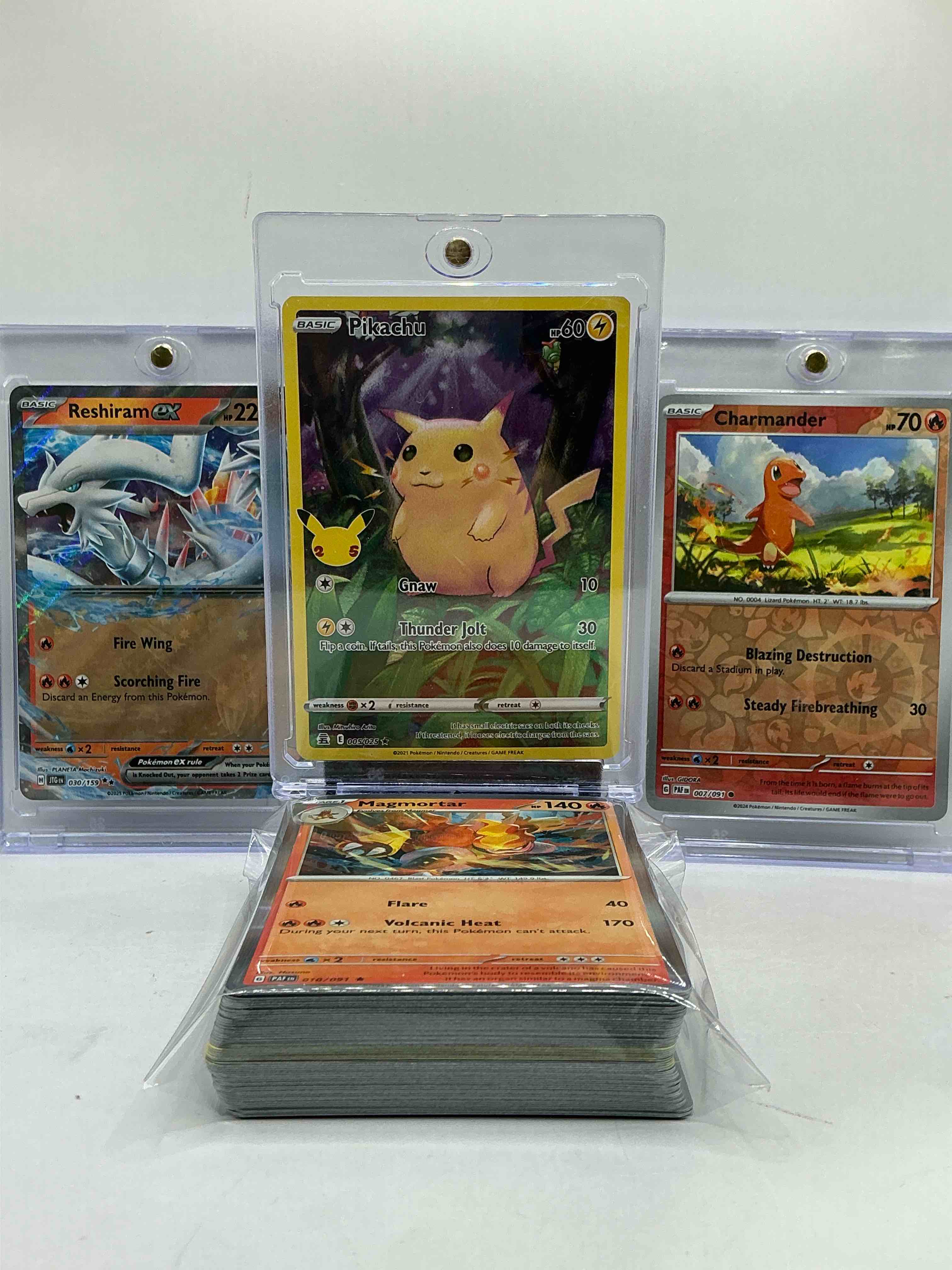 pikachu holo, charmander holo, reshiram ex & more! pokémon palooza! this 50 card lot includes commons, legends & more!