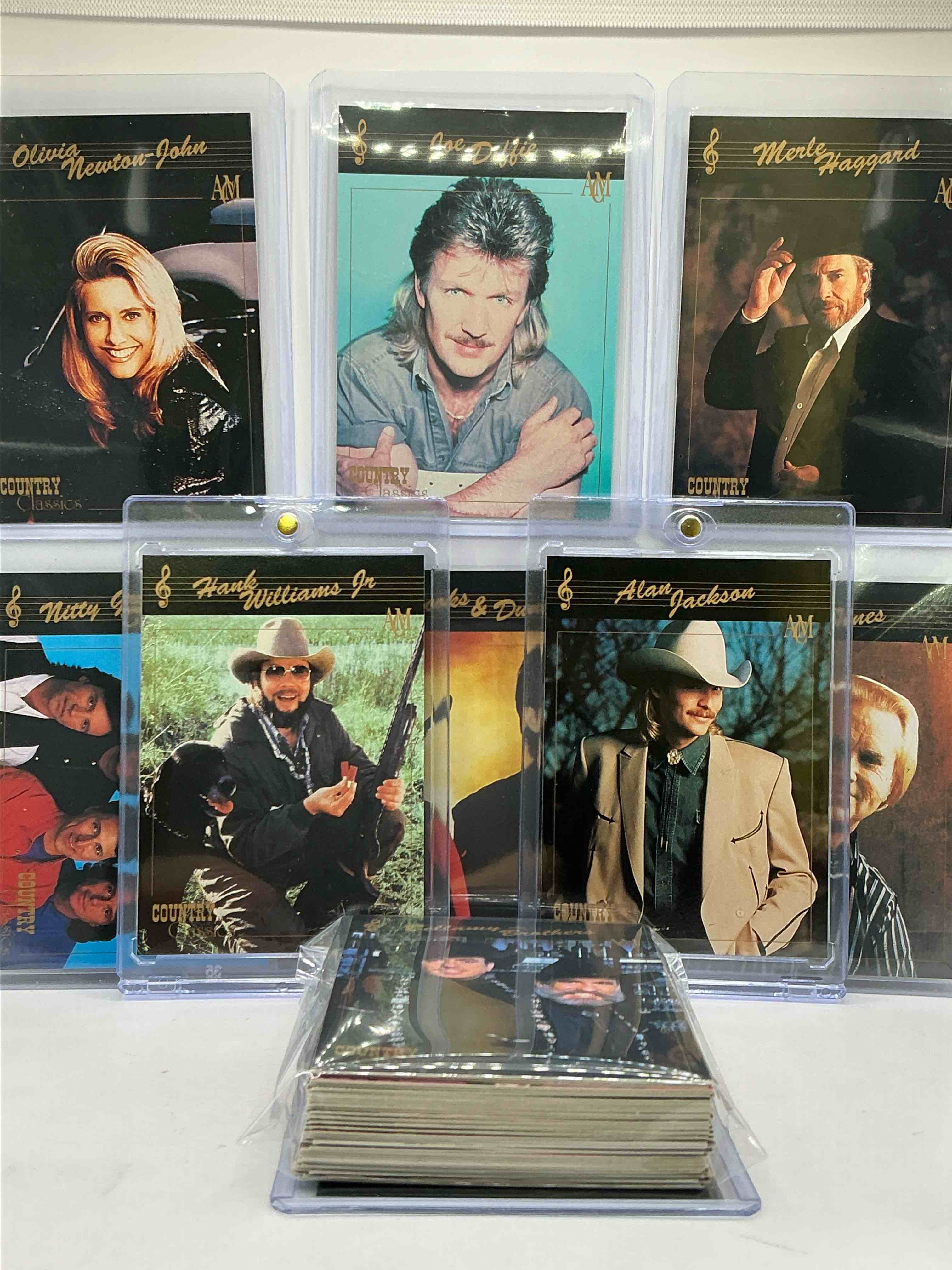 hank williams jr! alan jackson! no way! country music craziness! olivia newton john, george jones, nitty gritty, nashville skyline, joe diffe & more! insane 50 card country music lot! 1992 cards, some of the biggest names in the country world! perfect for vintage, authentic & real country fans! 