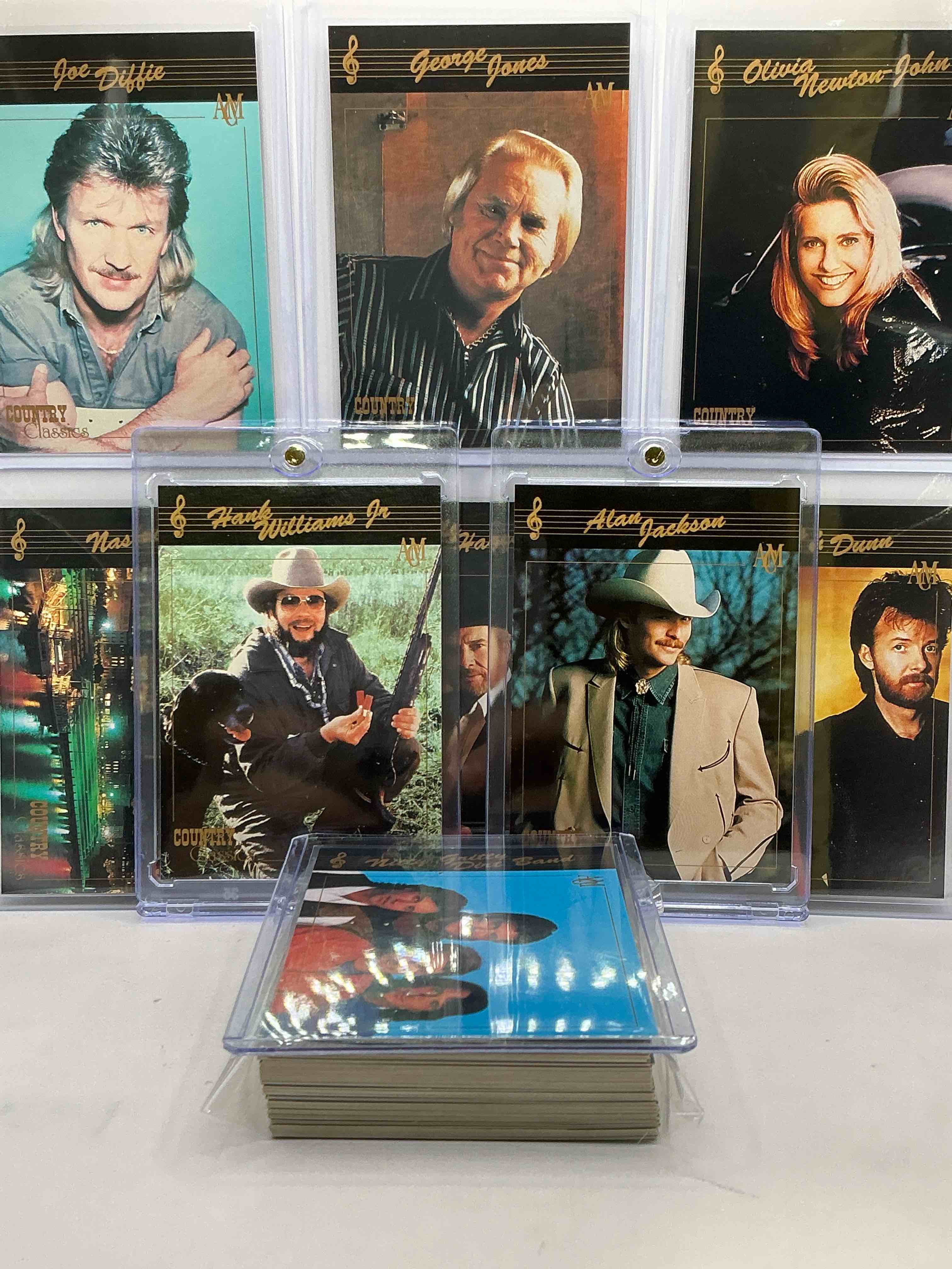 hank williams jr! alan jackson! no way! country music craziness! olivia newton john, george jones, nitty gritty, nashville skyline, joe diffe & more! insane 50 card country music lot! 1992 cards, some of the biggest names in the country world! perfect for vintage, authentic & real country fans! 