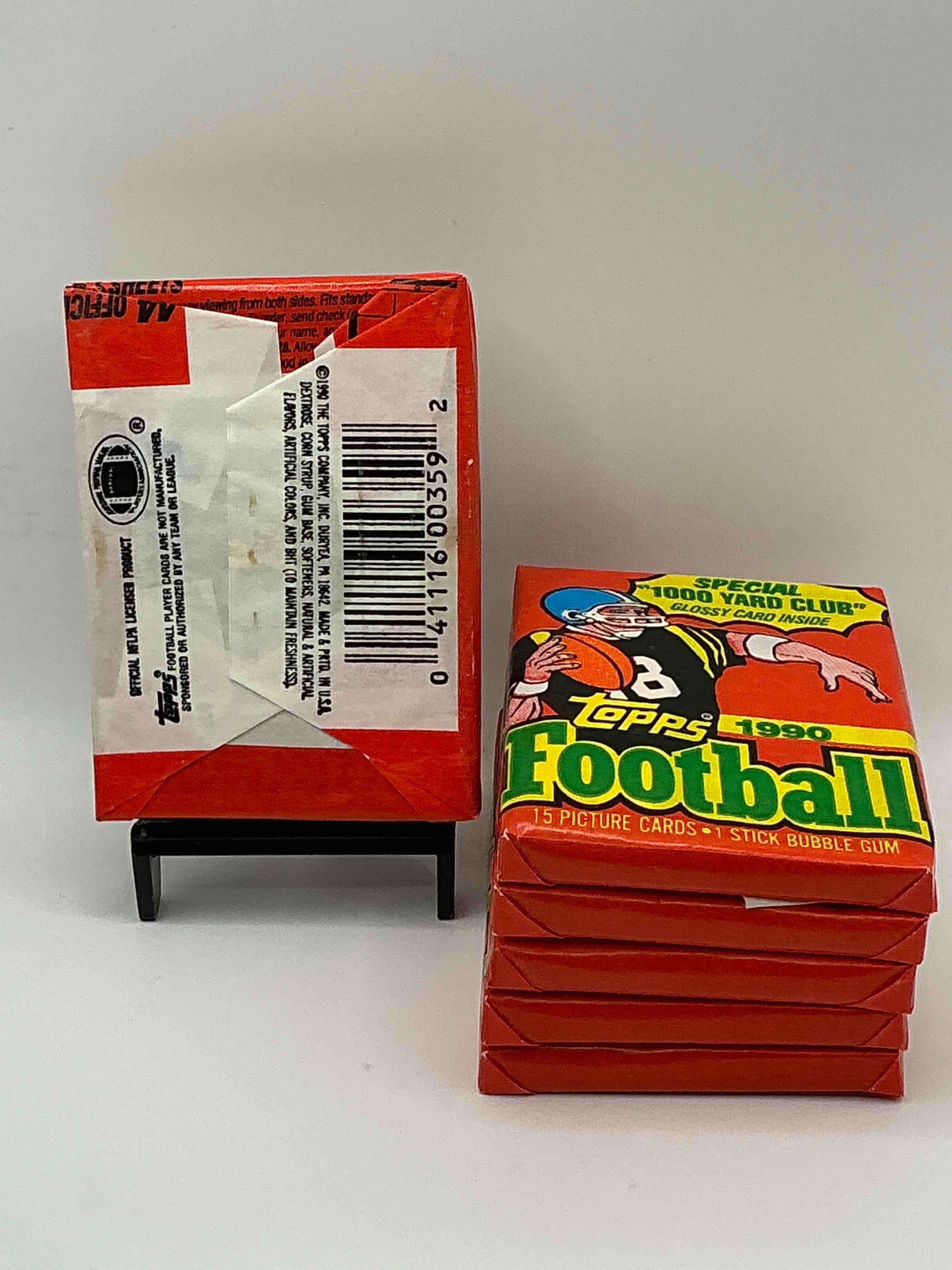 Condition photo showing New/Like New for The Last Year Of Football Wax! Joe Montana, Emmitt Smith & Barry Sanders!? 1990 Topps Football Unopened Sports Card Wax Pack, Direct From Original Retail Box! Getting Hard To Find! Search For Early Barry Sanders & Jerry Rice & So Much More!