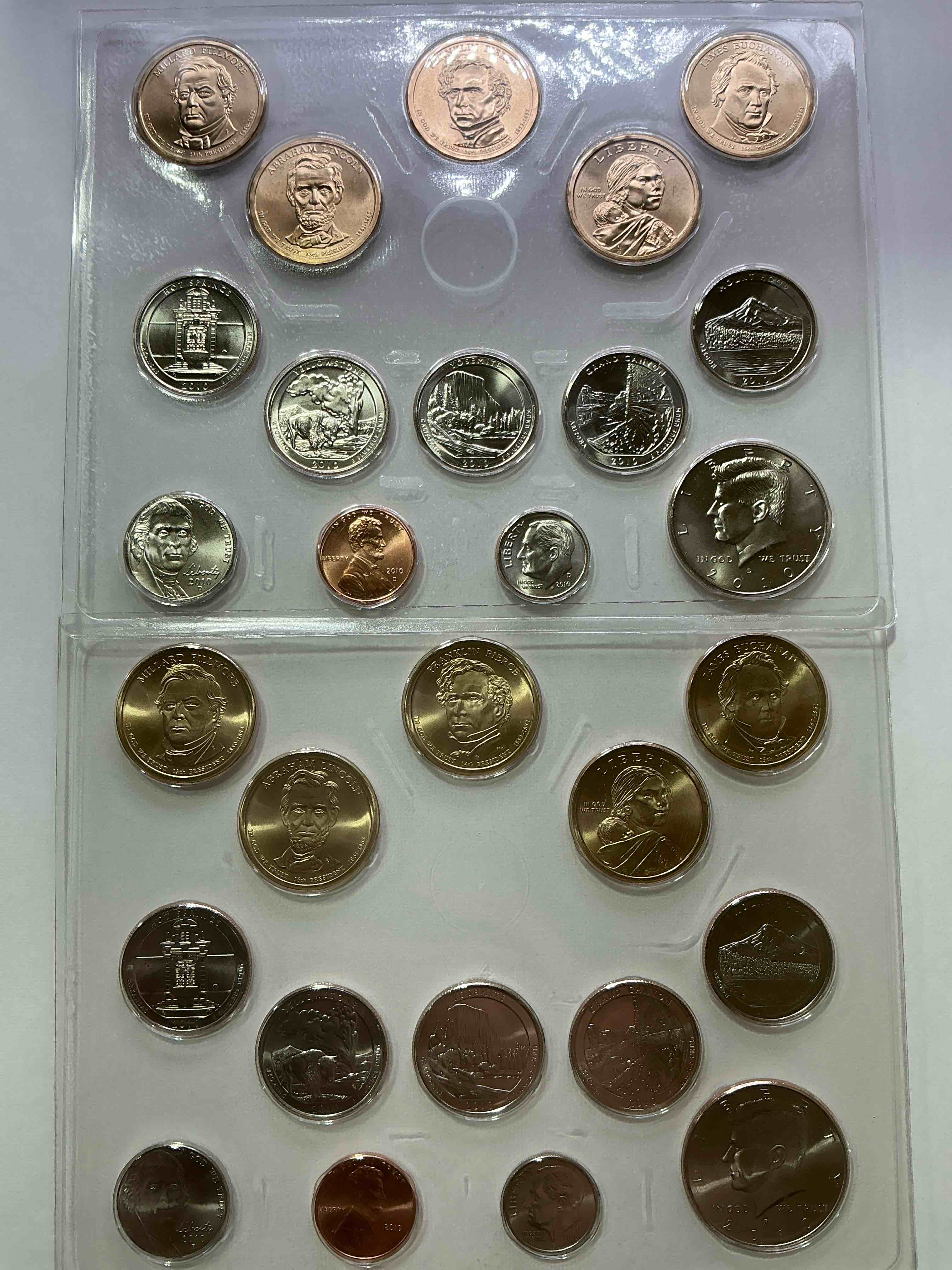 2010 uncirculated mint coins! 28 coin lot, with multiple dollar coins, half dollars, quarters, dimes, nickels & pennies! wow!