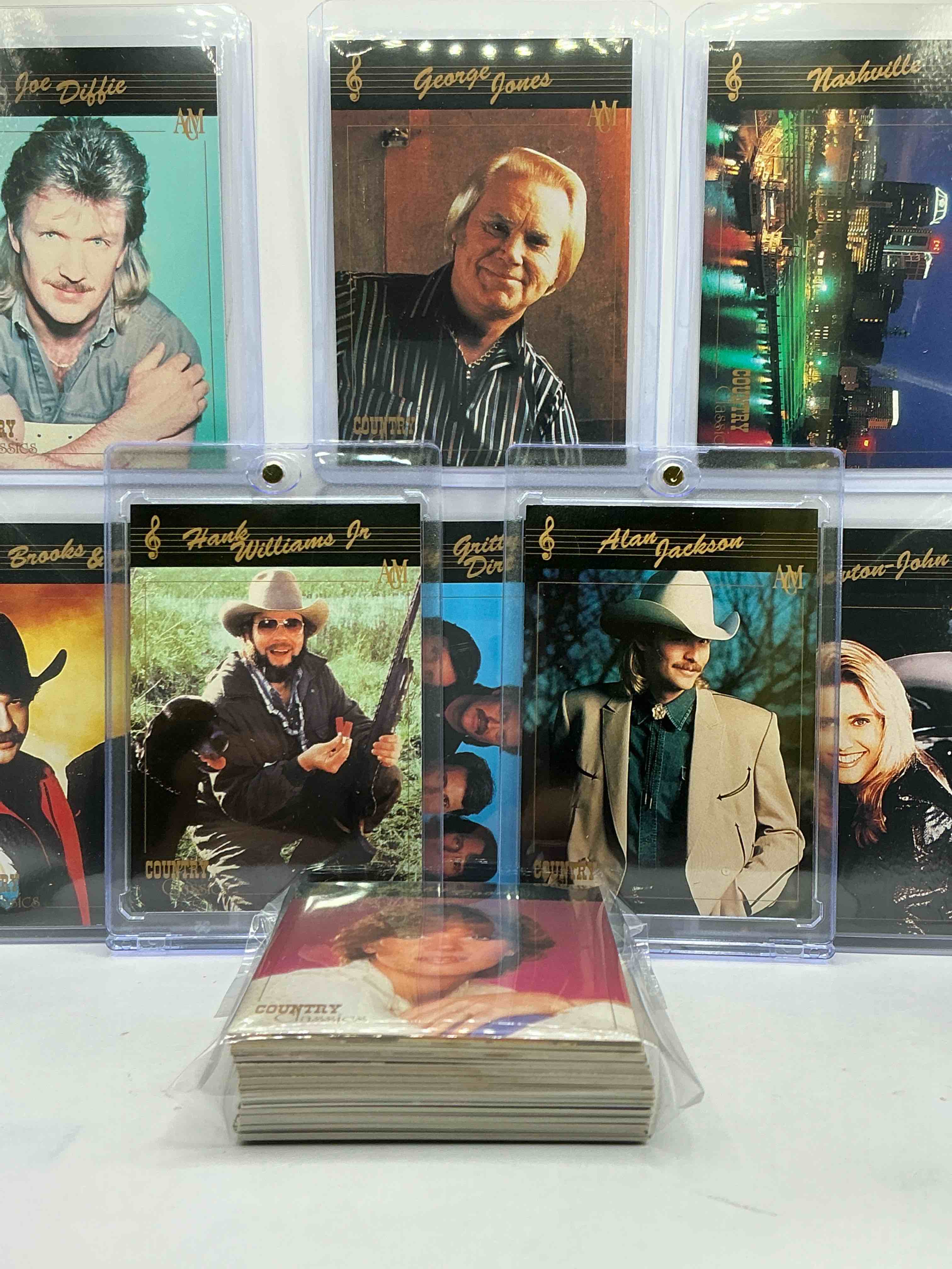 hank williams jr! alan jackson! no way! country music craziness! olivia newton john, george jones, nitty gritty, nashville skyline, joe diffe & more! insane 50 card country music lot! 1992 cards, some of the biggest names in the country world! perfect for vintage, authentic & real country fans! 