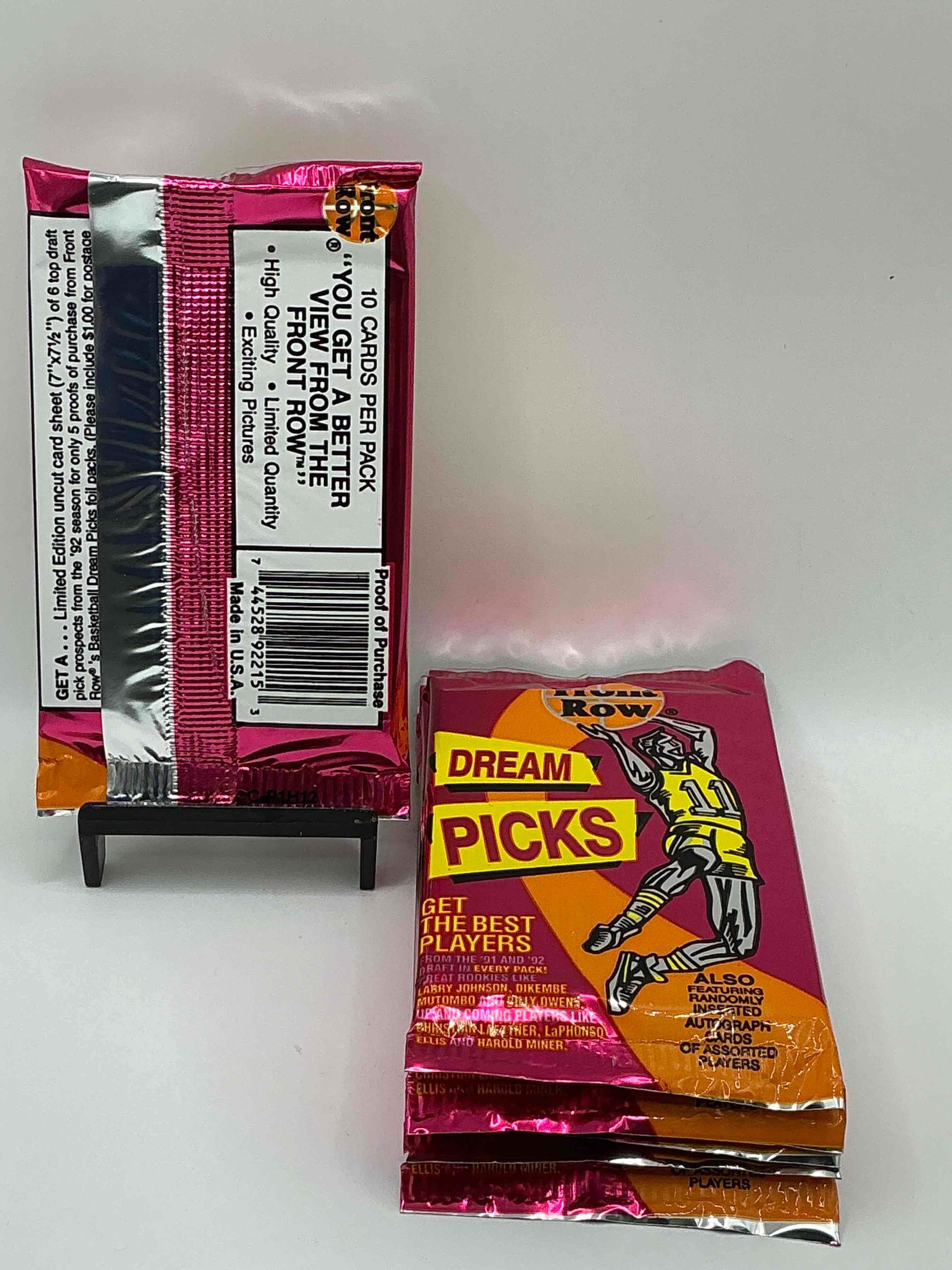 Condition photo showing New/Like New for 1991 Throwback Rarity! Here's Something You've Probably NEVER Seen! 1991 Front Row College Basketball / NBA Unopened Sealed Packs, Direct From Sealed Original Retail Case! Includes Randomly Inserted Rare Autograph Cards! Front Row Was The “Original" College Jersey Card Packs Back In The Day & Has Long Been Defunct. These Cards Are Becoming Serious Collector Items Due To Their Scarcity. These Things Are Serious Rare! Own Some Great Sports Card History & Something You'll Rarely See Again!