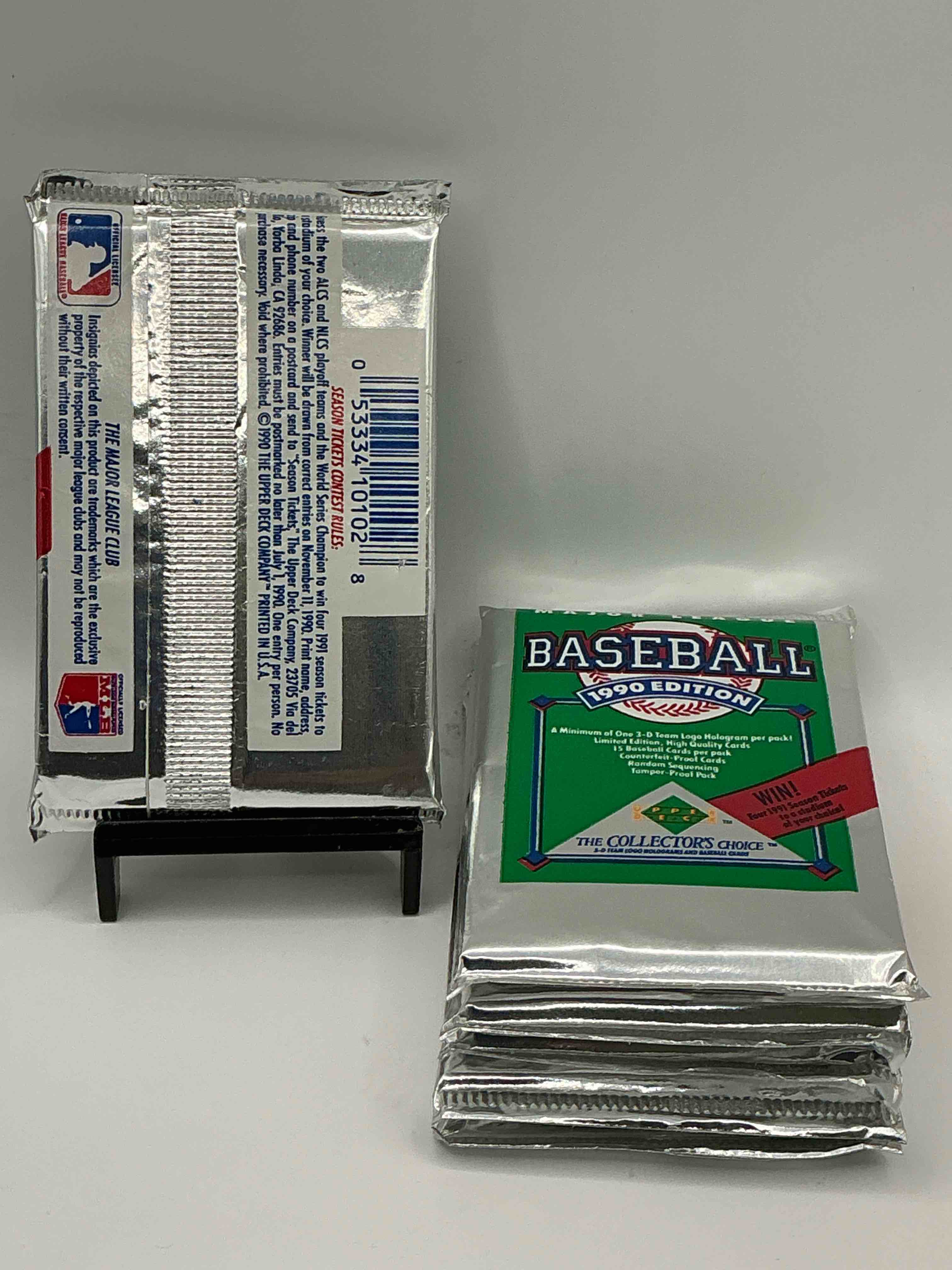 Condition photo showing New/Like New for 1990 Upper Deck Baseball Unopened Sports Trading Card Packs! Direct From Original Box! Look For Possible Collector's 3D Team Logo Card! As Well As Early Ken Griffey Jr. Cards!