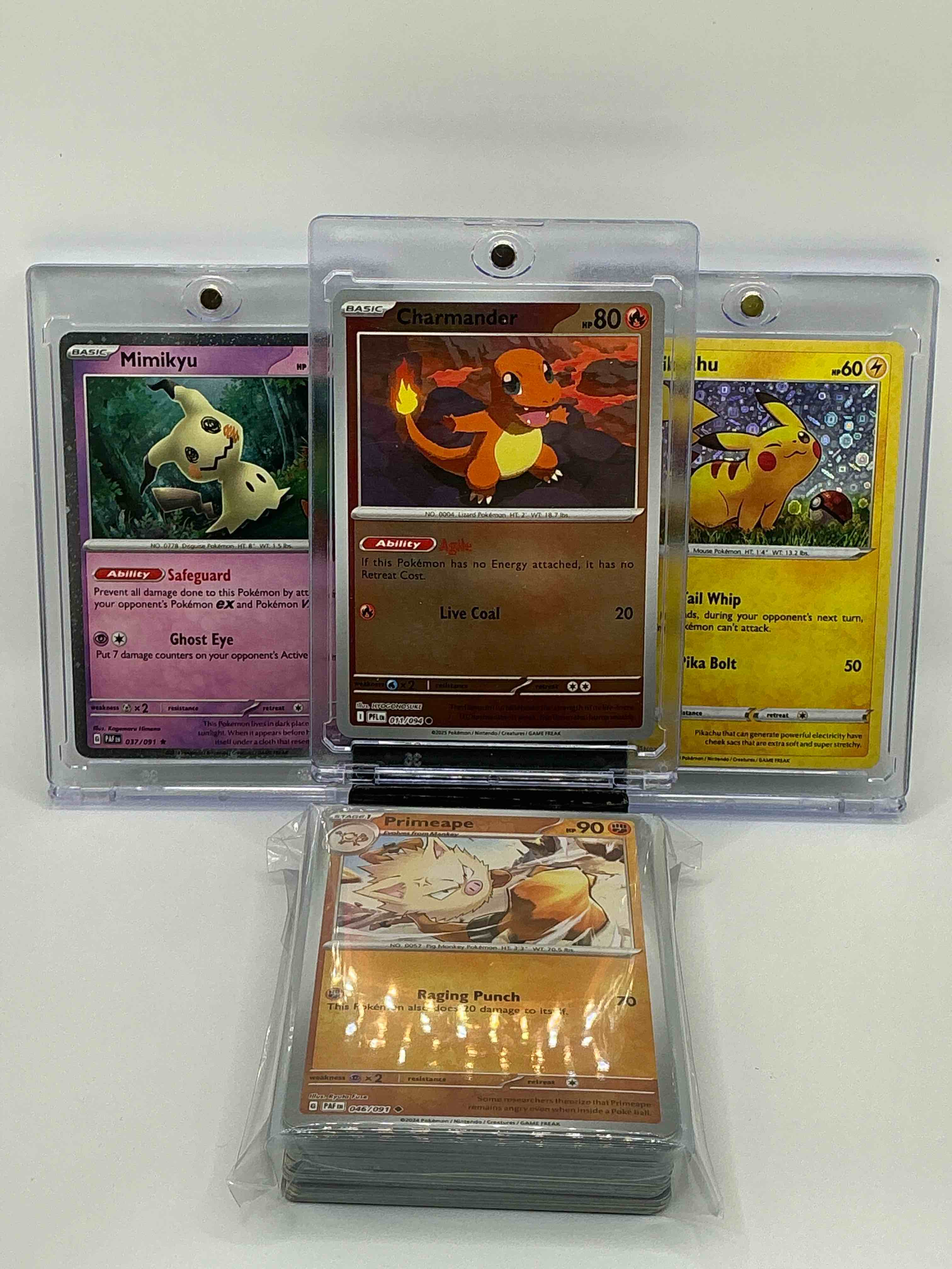 Pokémon Palooza! Silver & Orange Agile Live Coal Charmander! Silver & Purple Sparkle Safegaurd Ghost Eye Mimikyu! Silver & Yellow Sparkle Tail Whip Pika Bolt Pikachu! Along With 50 Other Pokémon Heroes, Holos, Legends & Commons!