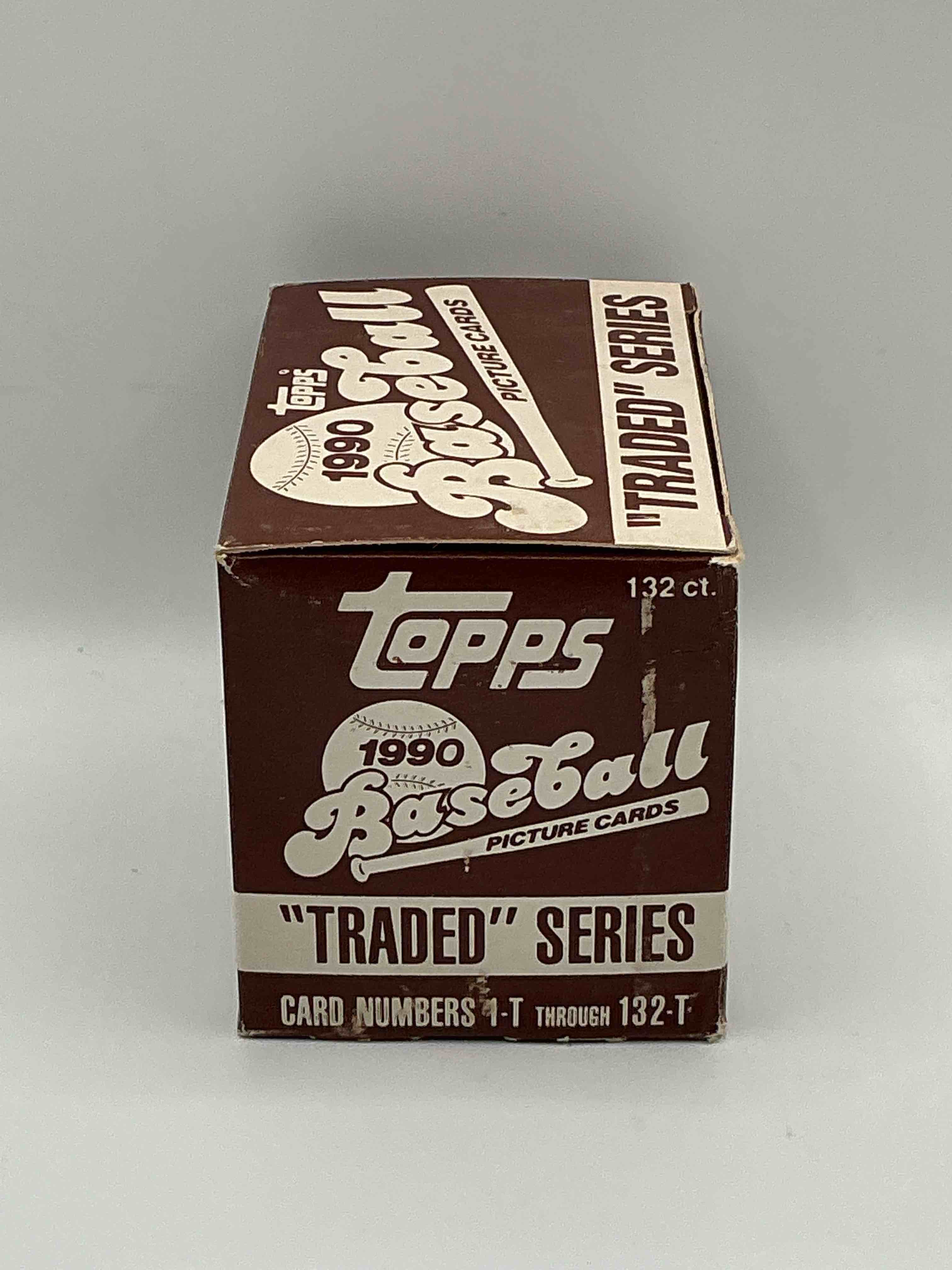 Condition photo showing New/Like New for 1990 Topps Baseball Card Complete Unopened Traded Series, Card Numbers 1-T Through 132-T. Set Is Unopened (These Sets Were Never Factory Sealed In Plastic From Manufacturer). Set Includes David Justice Traded Rookie. Great Sports Card Memorabilia!