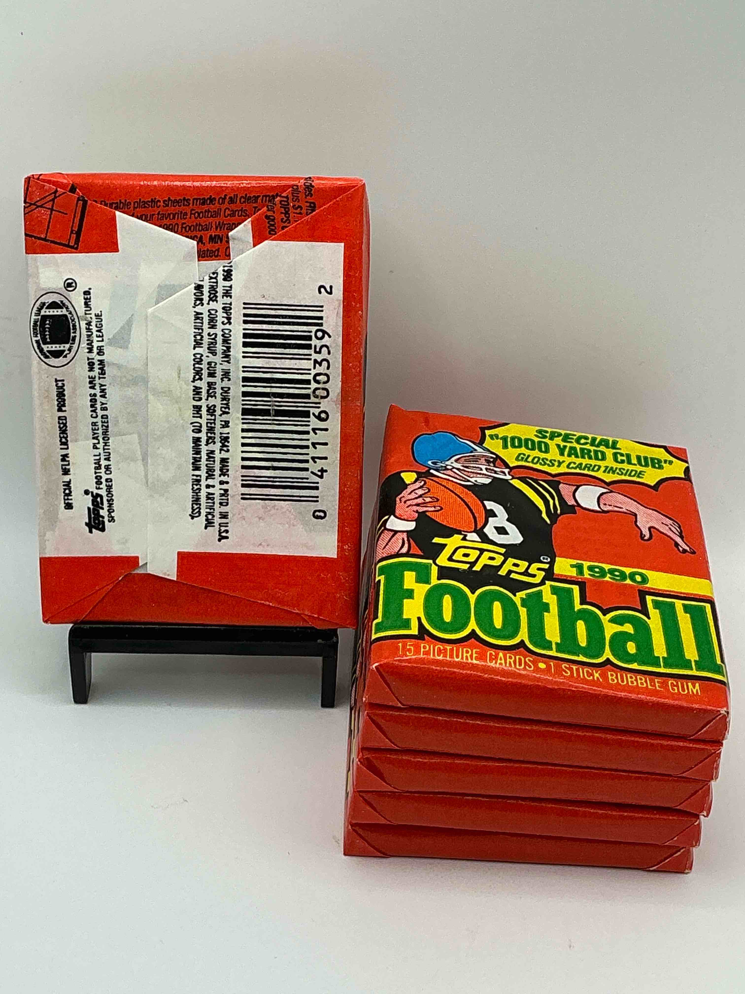 Condition photo showing New/Like New for The Last Year Of Football Wax! Joe Montana, Emmitt Smith & Barry Sanders!? 1990 Topps Football Unopened Sports Card Wax Pack, Direct From Original Retail Box! Getting Hard To Find! Search For Early Barry Sanders & Jerry Rice & So Much More!