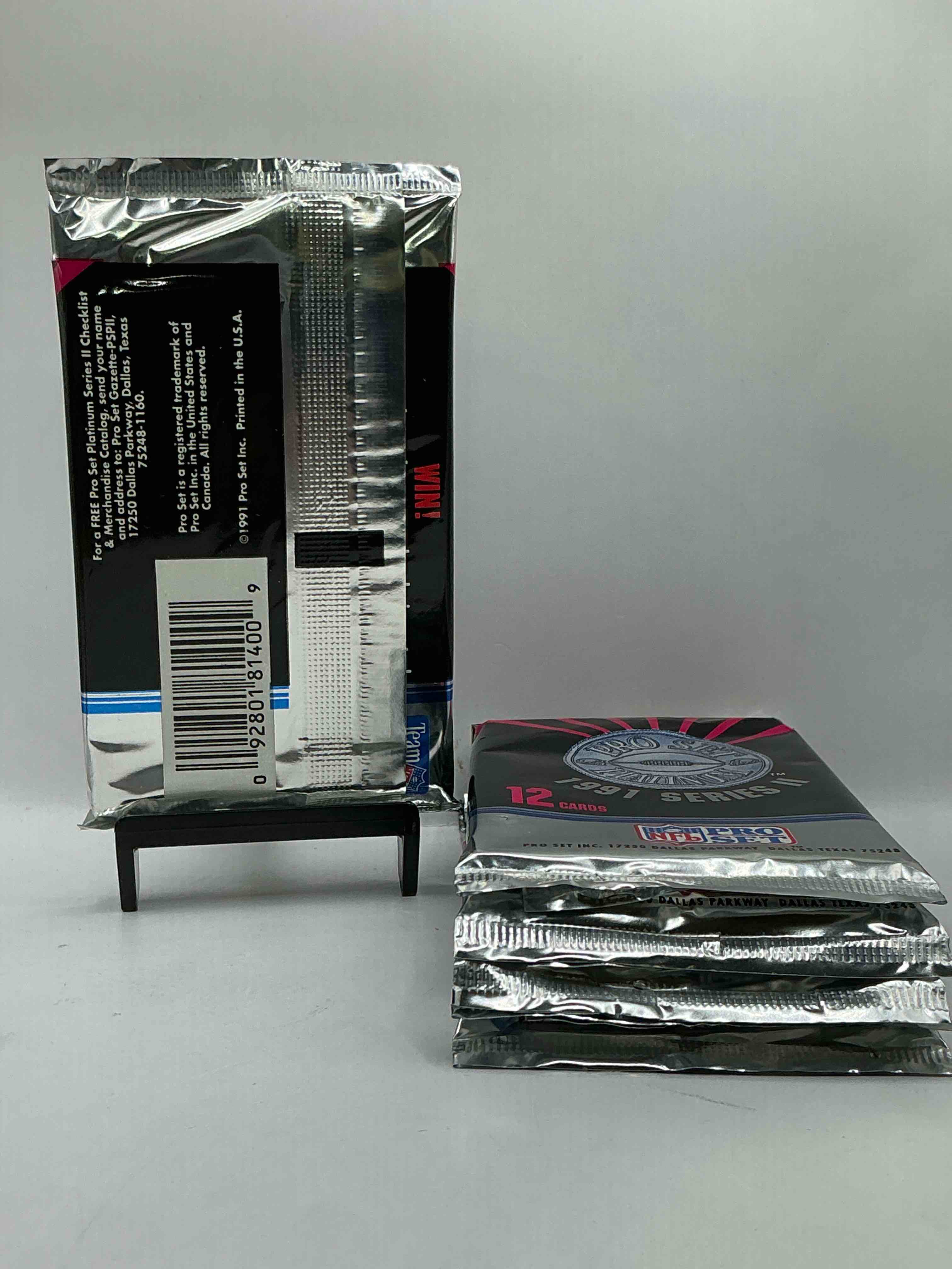 Condition photo showing New/Like New for 1991 Pro Set Platinum Edition Series II Unopened Packs! Search For Brett Favre Rookie & Bill Belichick Coach Rookie Card As Well As Santa Claus Card!