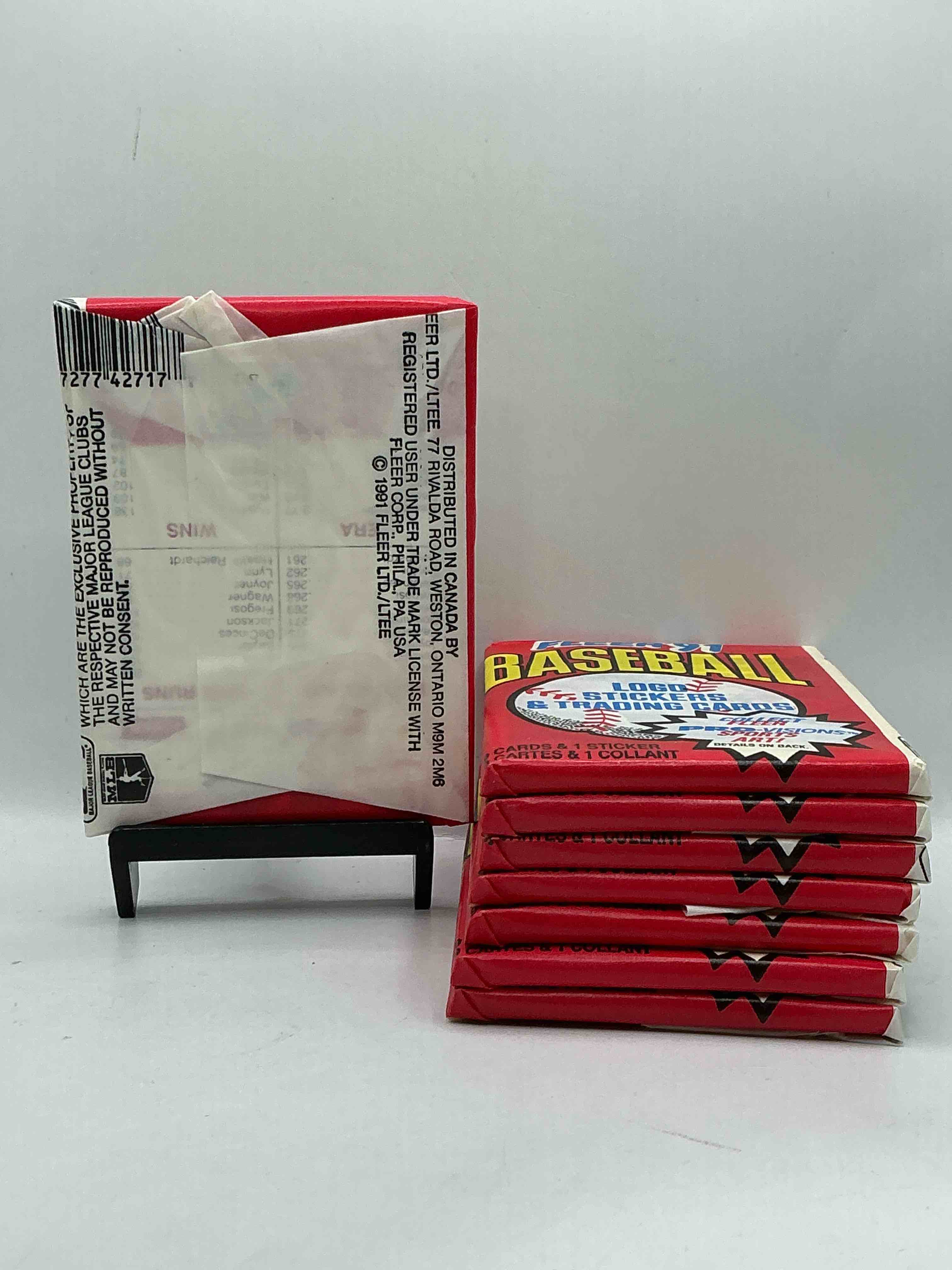 Condition photo showing New/Like New for 1991 Fleer Baseball Unopened Pack, Direct From Original Sealed Retail Case! Search For Griffey Jr. & Barry Bonds "Generation Stars" Combo Card #710 (PSA 10 Value $200), Nolan Ryan, Don Mattingly & So Much More!
