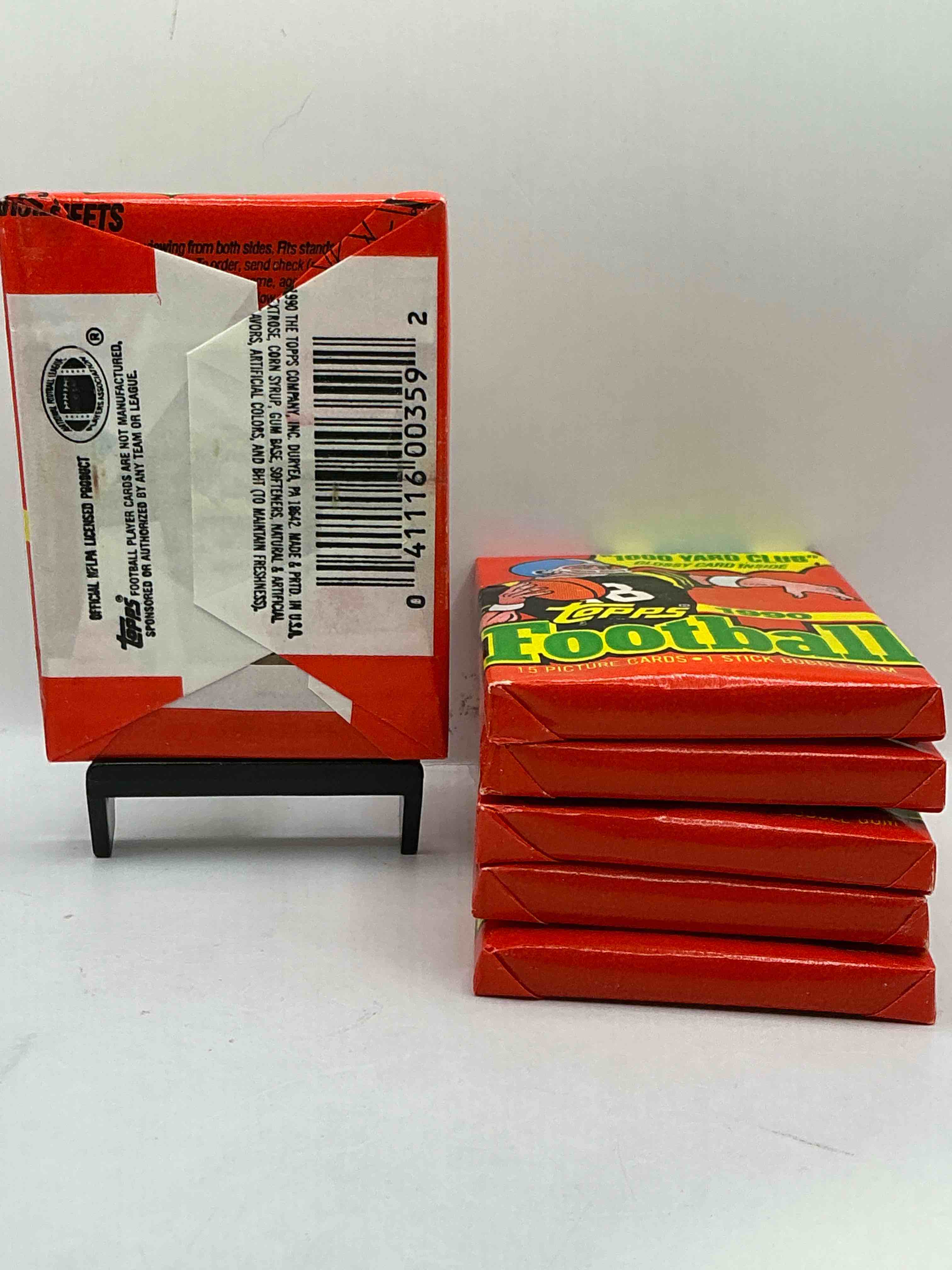 Condition photo showing New/Like New for The Last Year Of Football Wax! Joe Montana, Emmitt Smith & Barry Sanders!? 1990 Topps Football Unopened Sports Card Wax Pack, Direct From Original Retail Box! Getting Hard To Find! Search For Early Barry Sanders & Jerry Rice & So Much More!