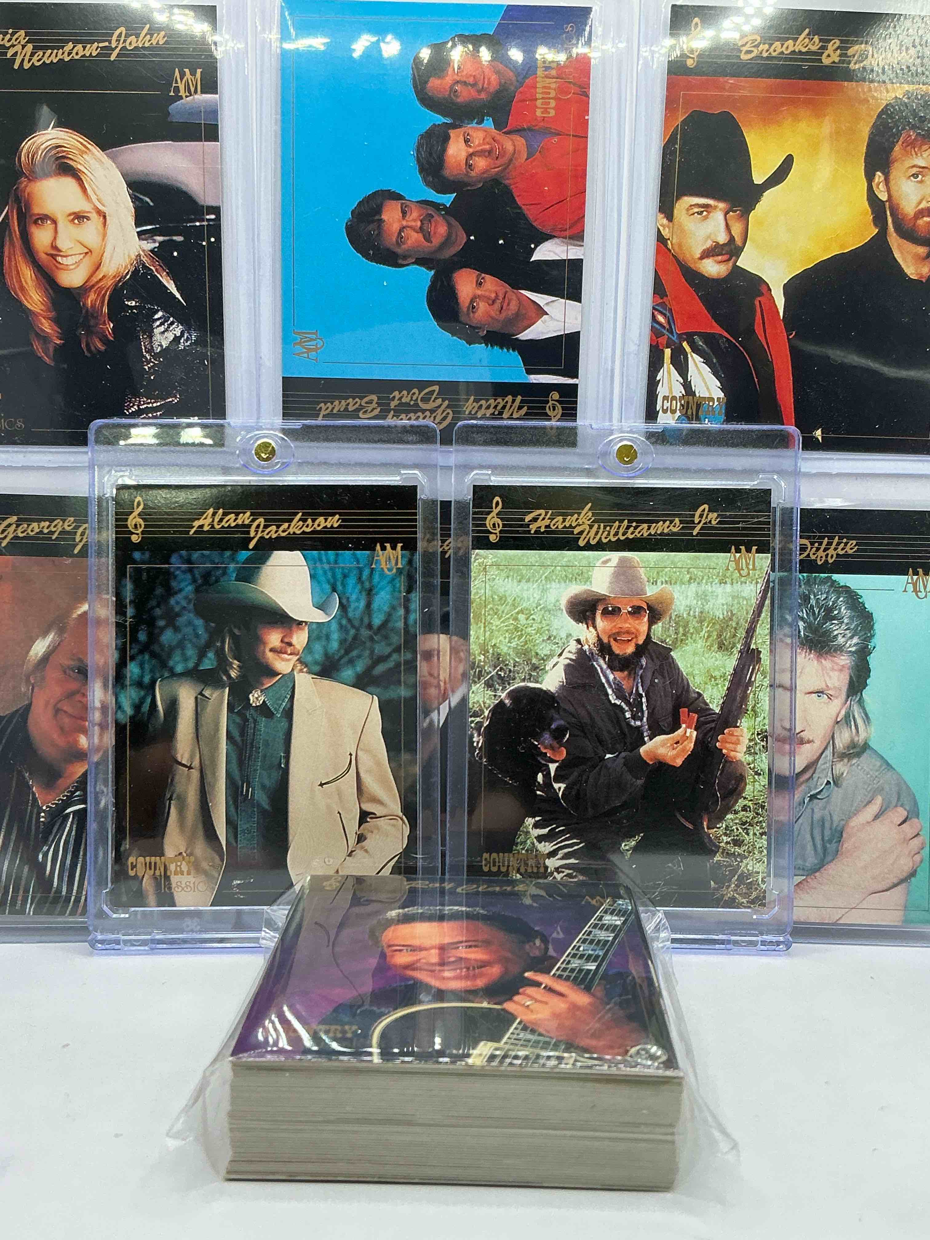 Condition photo showing New/Like New for Hank Williams Jr! Alan Jackson! NO WAY! Country Music Craziness! Olivia Newton John, George Jones, Nitty Gritty, Nashville Skyline, Joe Diffe & More! Insane 50 Card Country Music Lot! 1992 Cards, Some Of The Biggest Names In The Country World! PERFECT For Vintage, Authentic & Real Country Fans!