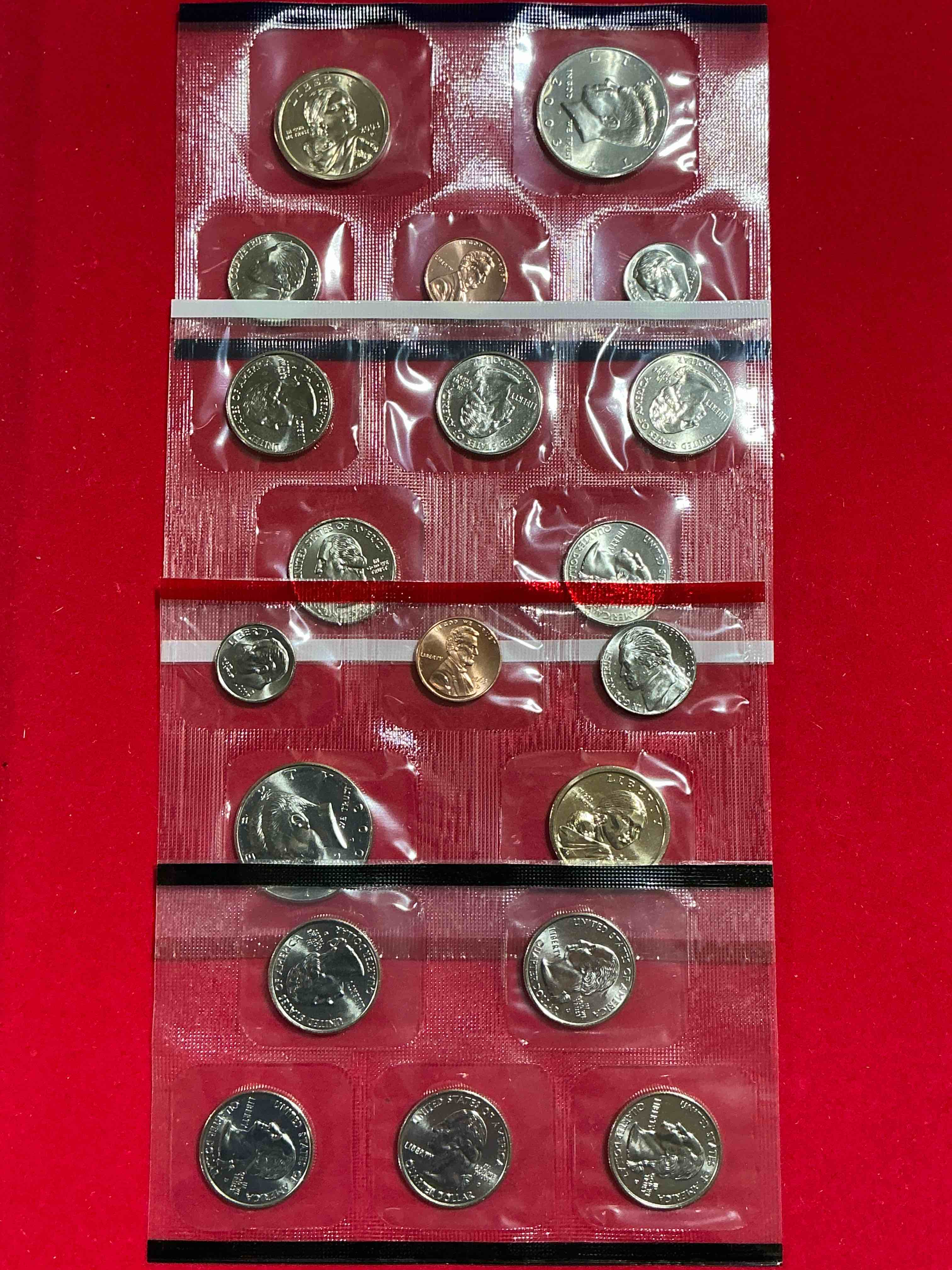 2003 uncirculated mint coins! 20 coins from philadelphia & denver! 20 coin uncirculated lot, with state quarters, nickels, half dollars, dimes, pennies & more! uncirculated coin craziness!