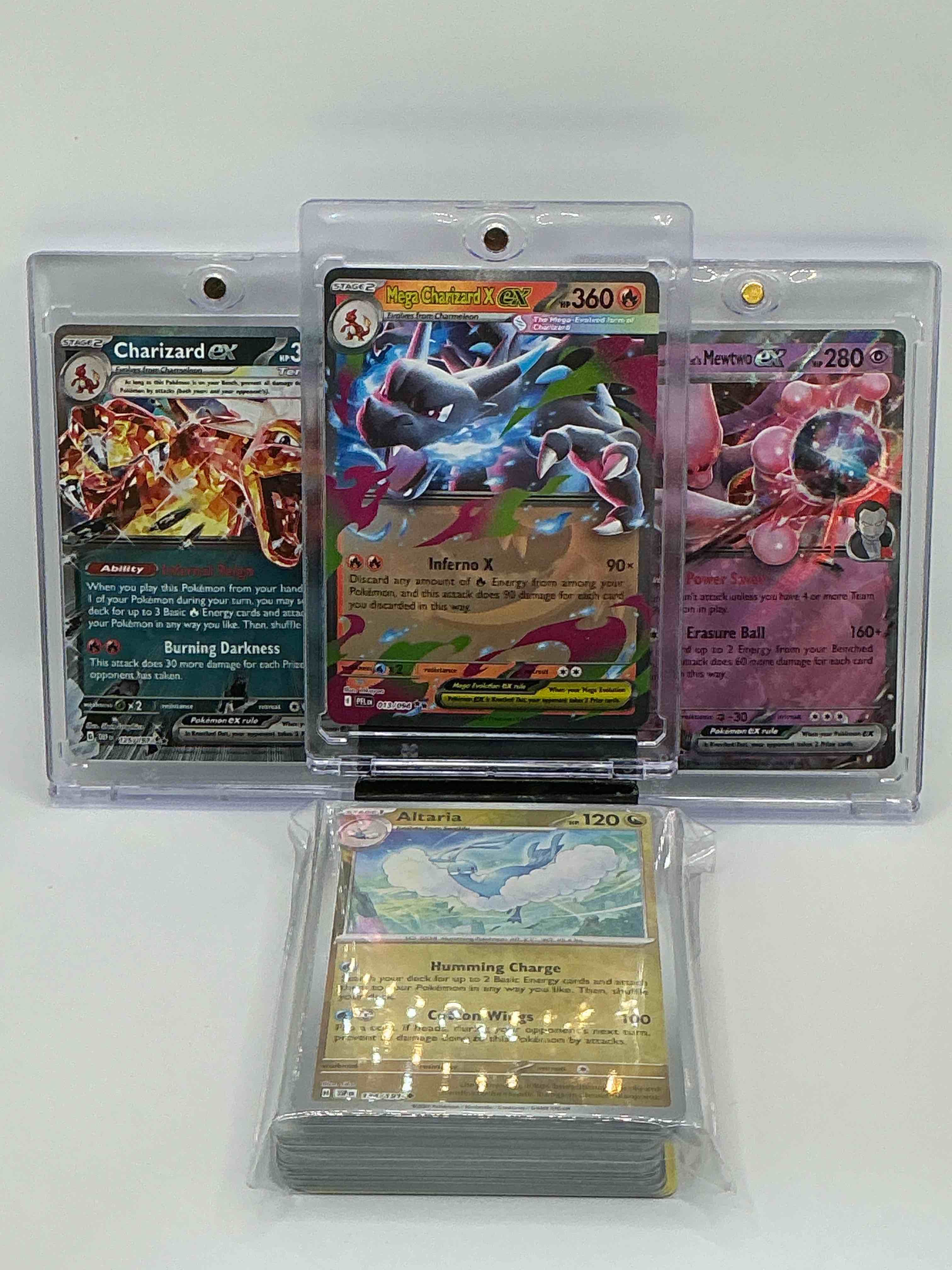 pokémon palooza! silver shimmer inferno x mega charizard x ex! silver shimmer infernal reign burning darkness charizard ex! silver & pink shimmer power saver erasure ball team rocket’s mewtwo ex! along with 50 other pokémon heroes, holos, legends & commons!