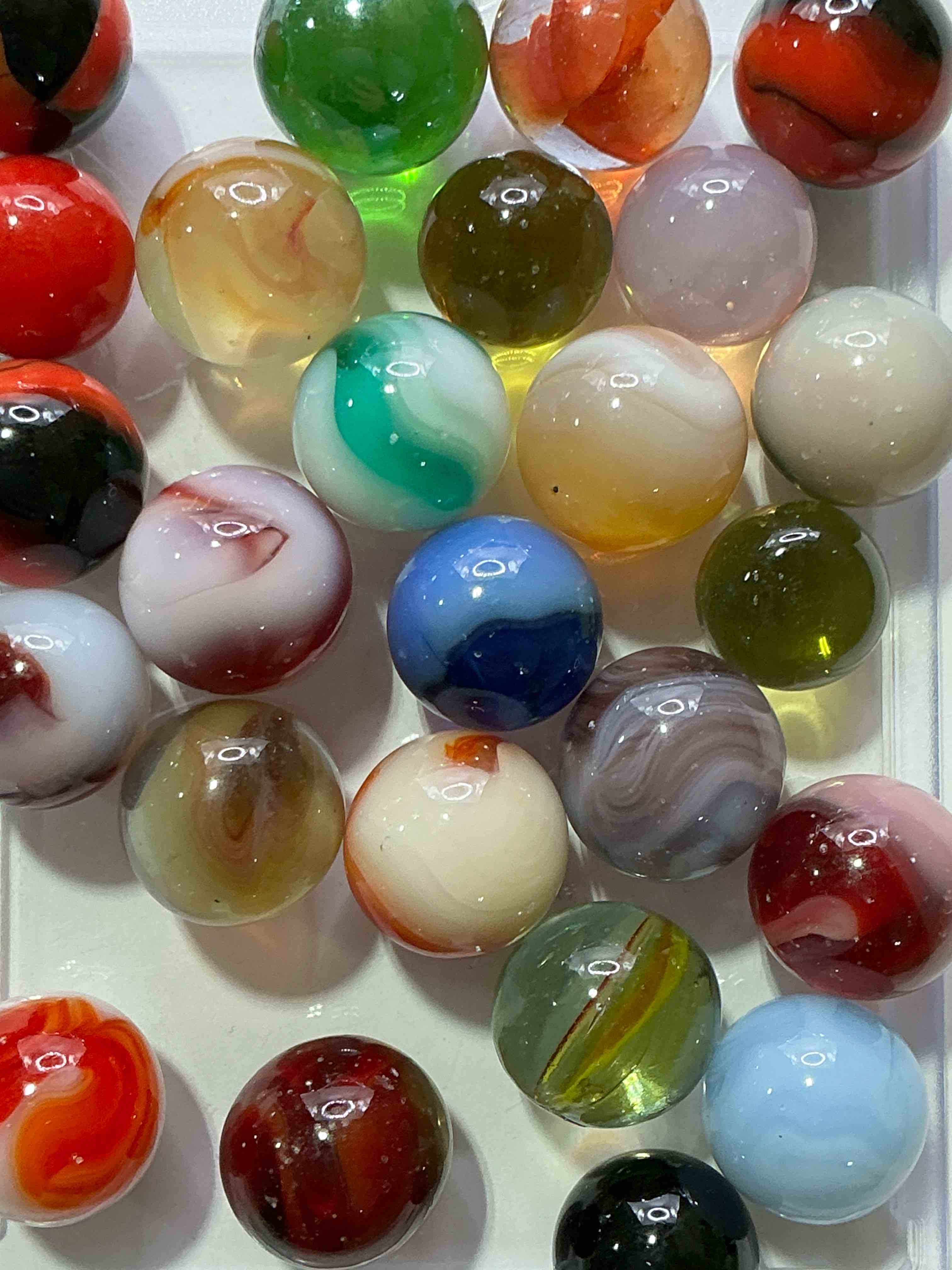 Condition photo showing New/Like New for Antique Glass Marbles! Genuine Stunning Marbles Lot, All Marbles Made Between The Years 1925-1965 & Made With Uranium! Many Are Great Depression Era & Even Earlier! Gorgeous, Authentic Pieces Of History!  