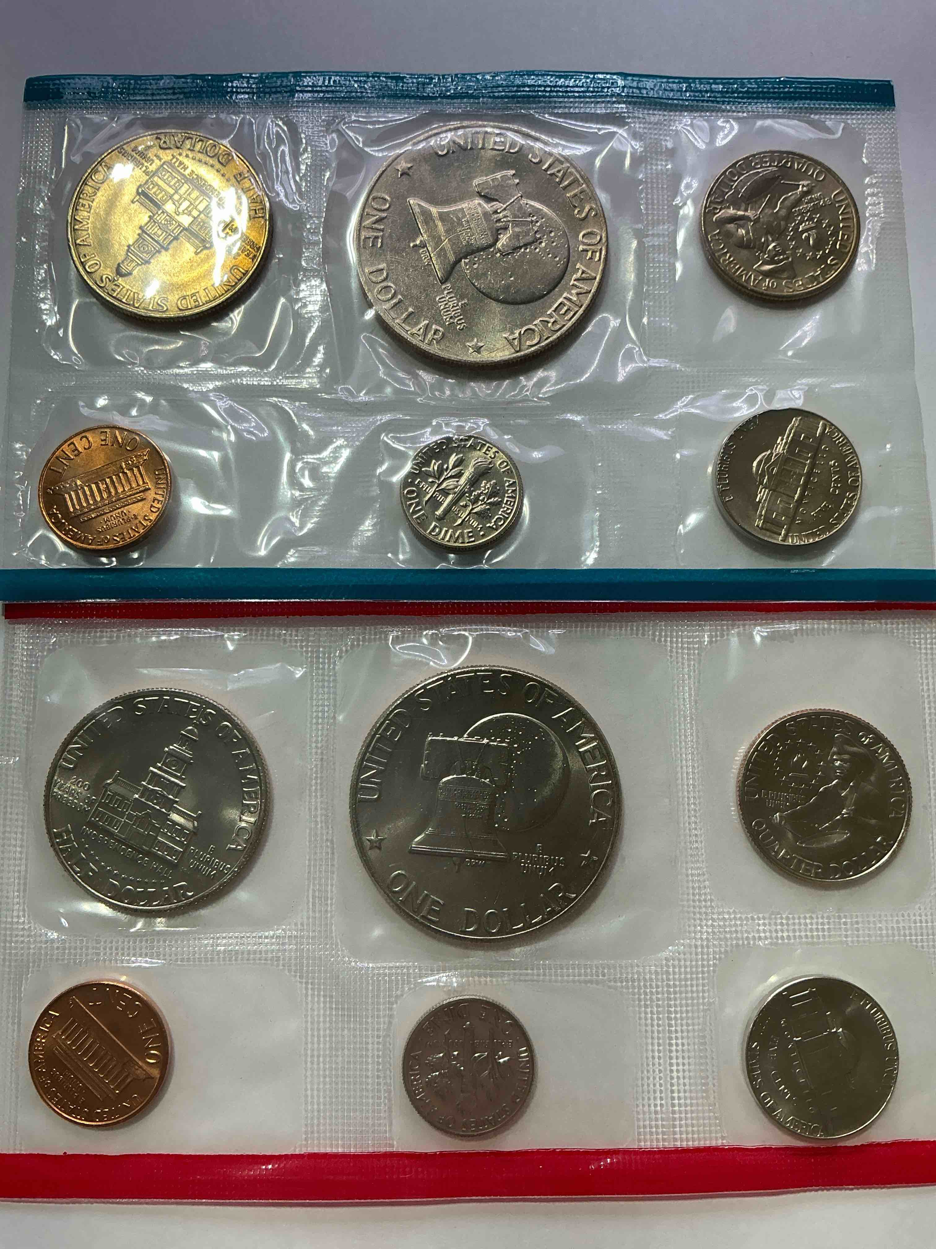 Condition photo showing New/Like New for 1976 Bicentennial Bliss! In 1976 The U.S. Mint Set Celebrating The 200 Year Anniversary Of America! 12 Coin Set Including Bicentennial Quarters, IKEs, Kennedy Halves & Pennies! Highly Desirable For Collectors! Own Pieces Of History & Celebrating America's 250 Year Anniversary Coming Soon!
