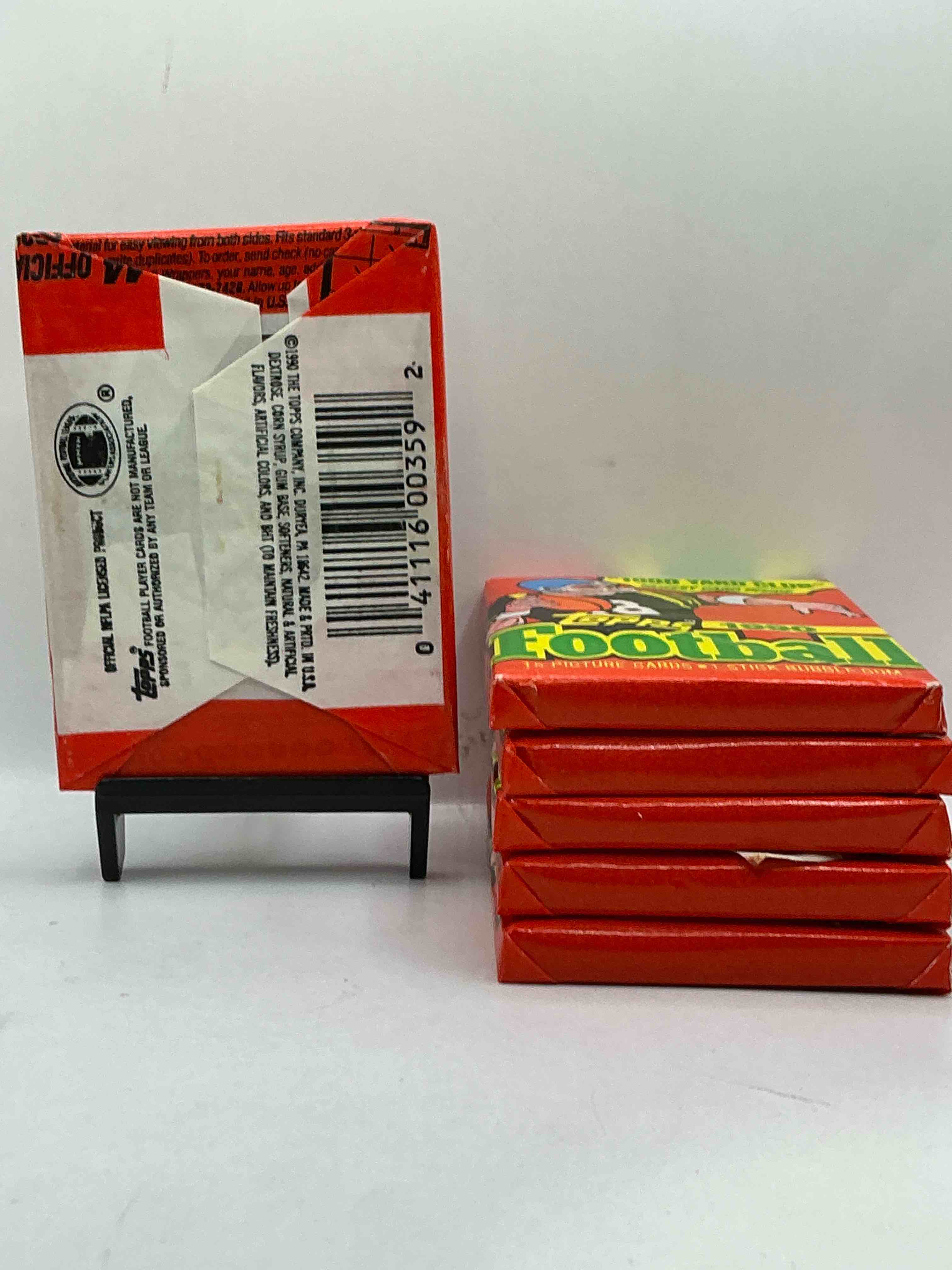 Condition photo showing New/Like New for The Last Year Of Football Wax! Joe Montana, Emmitt Smith & Barry Sanders!? 1990 Topps Football Unopened Sports Card Wax Pack, Direct From Original Retail Box! Getting Hard To Find! Search For Early Barry Sanders & Jerry Rice & So Much More!