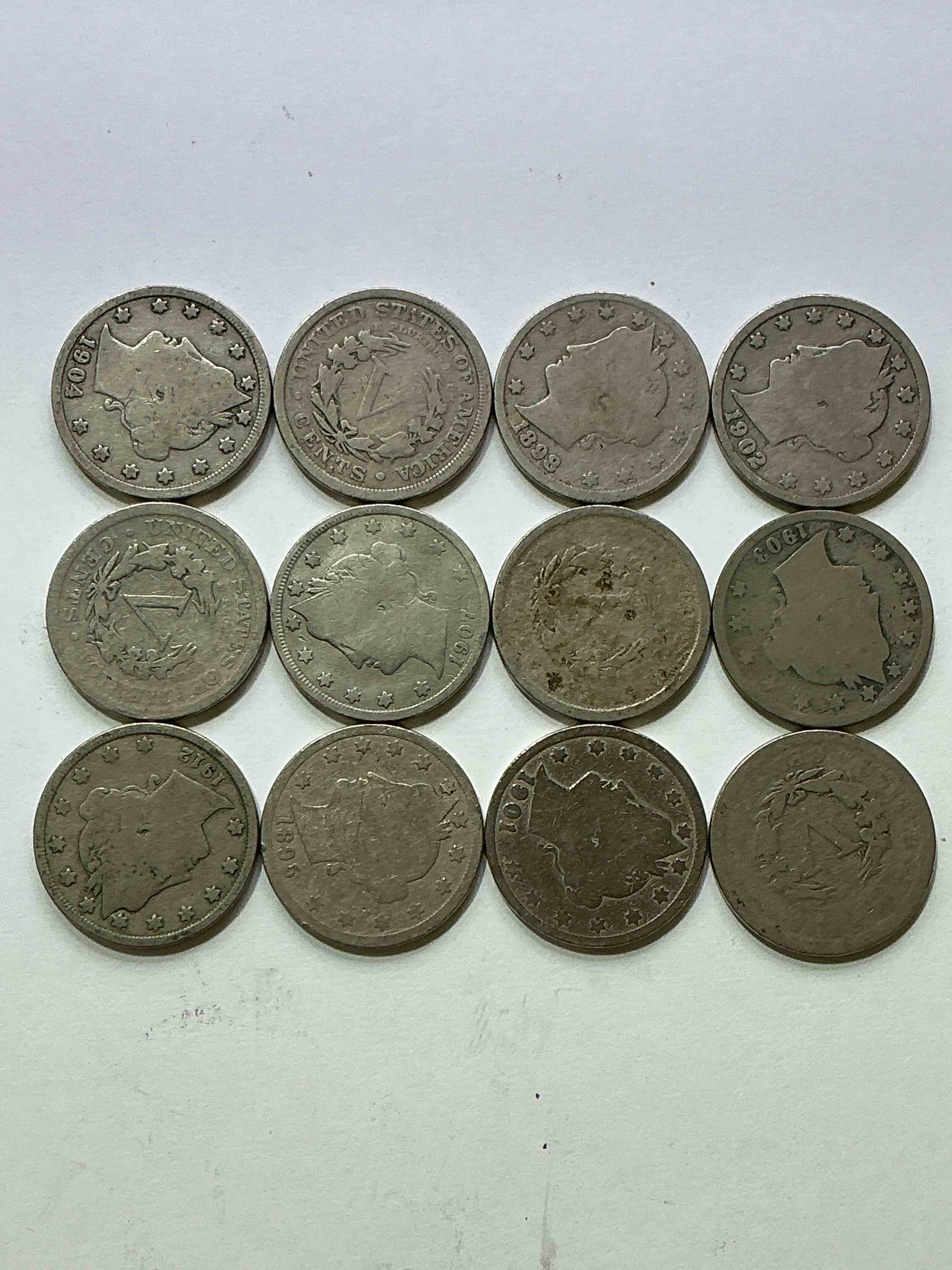 Condition photo showing Good Condition for Antique U.S. V Nickels! Think Of The History These Coins Have Seen!, Liberty Head V Nickels Were Minted Up Until 1913 & Were The Style Of Nickels Before Buffalo Nickels. Own Some Cool Pieces Of History! Rare To See These Coins With The "Date On" In Circulated Condition!