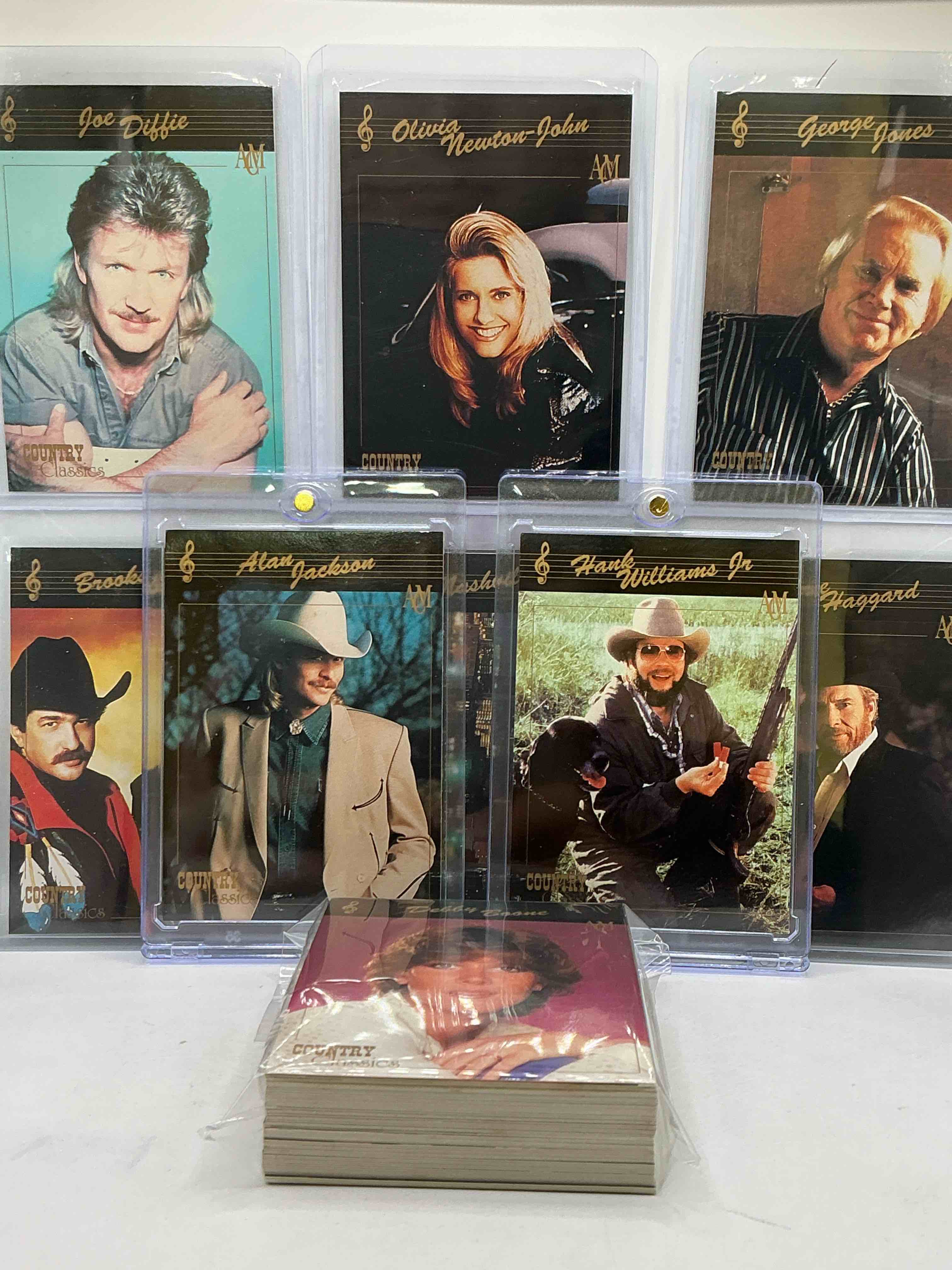Condition photo showing New/Like New for Hank Williams Jr! Alan Jackson! NO WAY! Country Music Craziness! Olivia Newton John, George Jones, Nitty Gritty, Nashville Skyline, Joe Diffe & More! Insane 50 Card Country Music Lot! 1992 Cards, Some Of The Biggest Names In The Country World! PERFECT For Vintage, Authentic & Real Country Fans! 