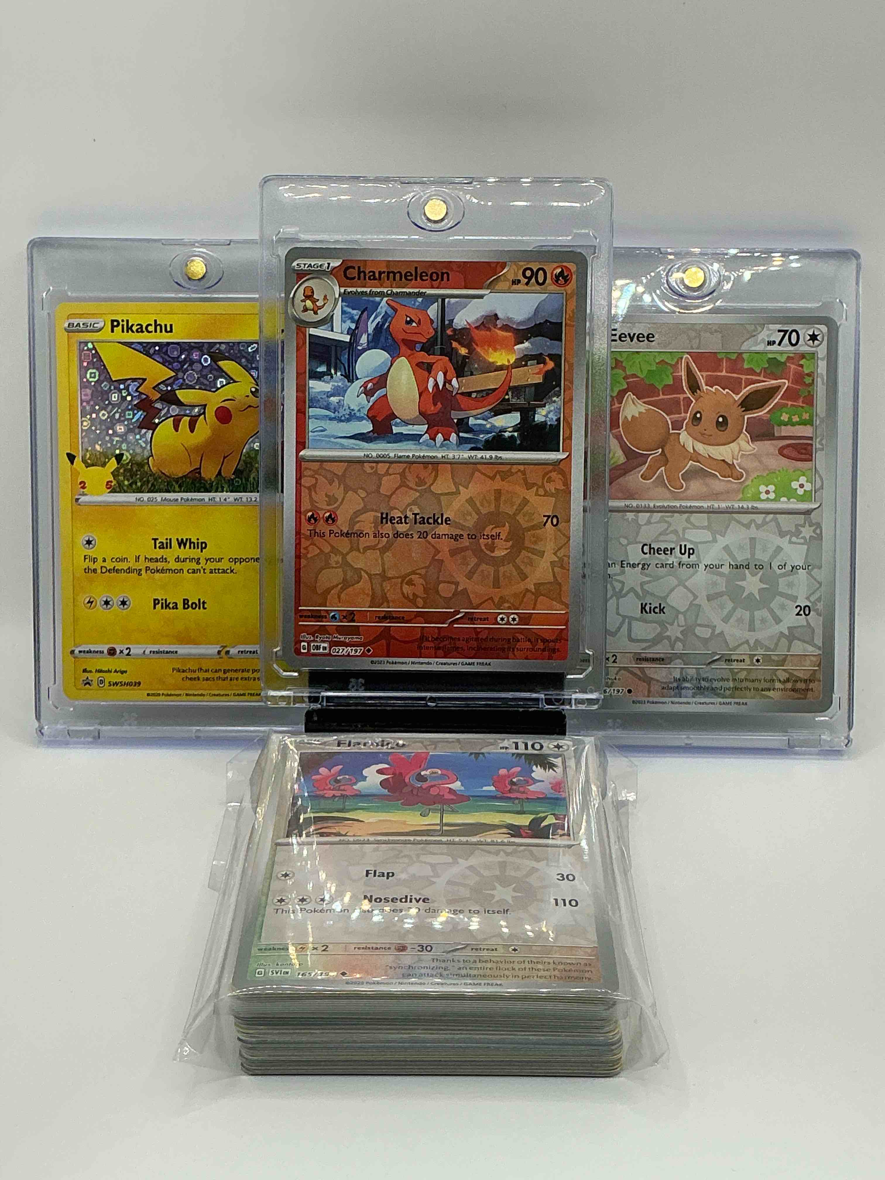 Pokémon Palooza! Silver & Orange Holographic Heat Tackle Charmeleon! Silver & Green Holographic Cheer Up Kick Eevee! Silver & Yellow Shimmer Tail Whip Pika Bolt Pikachu! Along With 50 Other Pokémon Heroes, Holos, Legends & Commons!