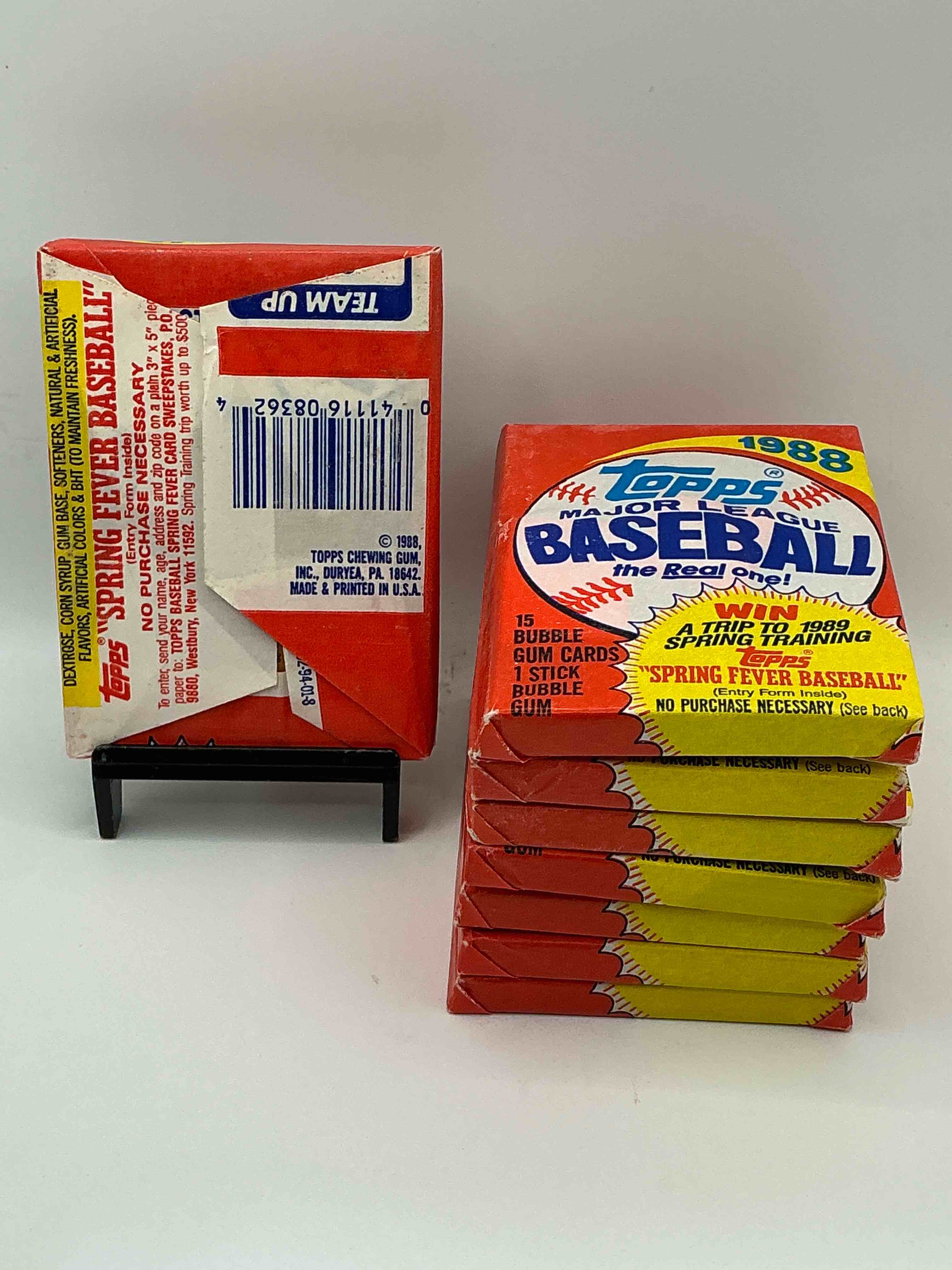 Condition photo showing New/Like New for 80's Baseball Fan's Rejoice! 1988 Topps Baseball Unopened Wax Packs Full Of Collectible Trading Cards! Search For Valuable Don Mattingly "World Of Baseball" & Nolan Ryan Cards Worth Hundreds In Perfect Condition!