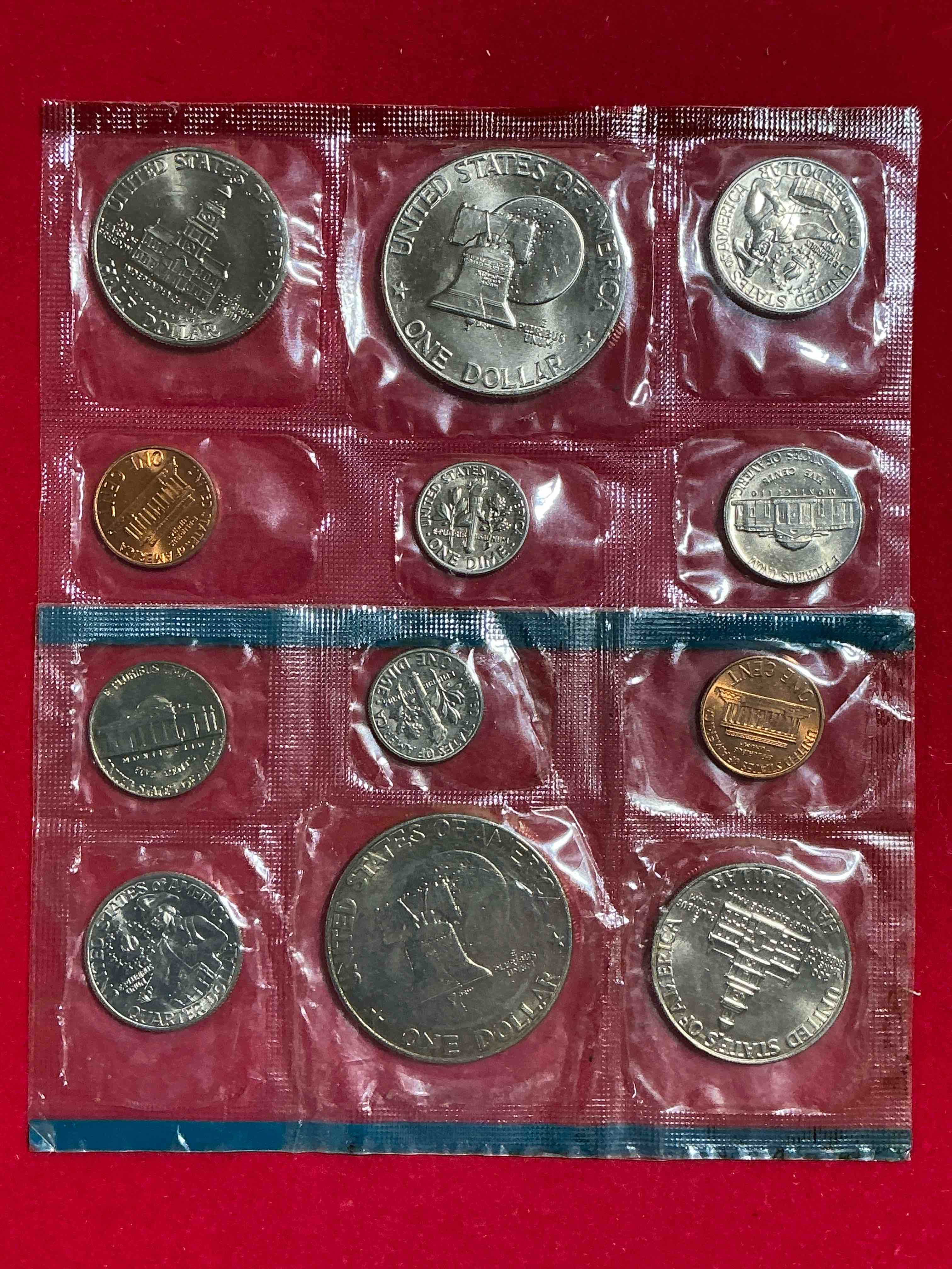 Condition photo showing New/Like New for 1976 Bicentennial Bliss! In 1976 The U.S. Mint Set Celebrating The 200 Year Anniversary Of America! 12 Coin Set Including Bicentennial Quarters, IKEs, Kennedy Halves & Pennies! Highly Desirable For Collectors! Own Pieces Of History & Celebrating America's 250 Year Anniversary Coming Soon!