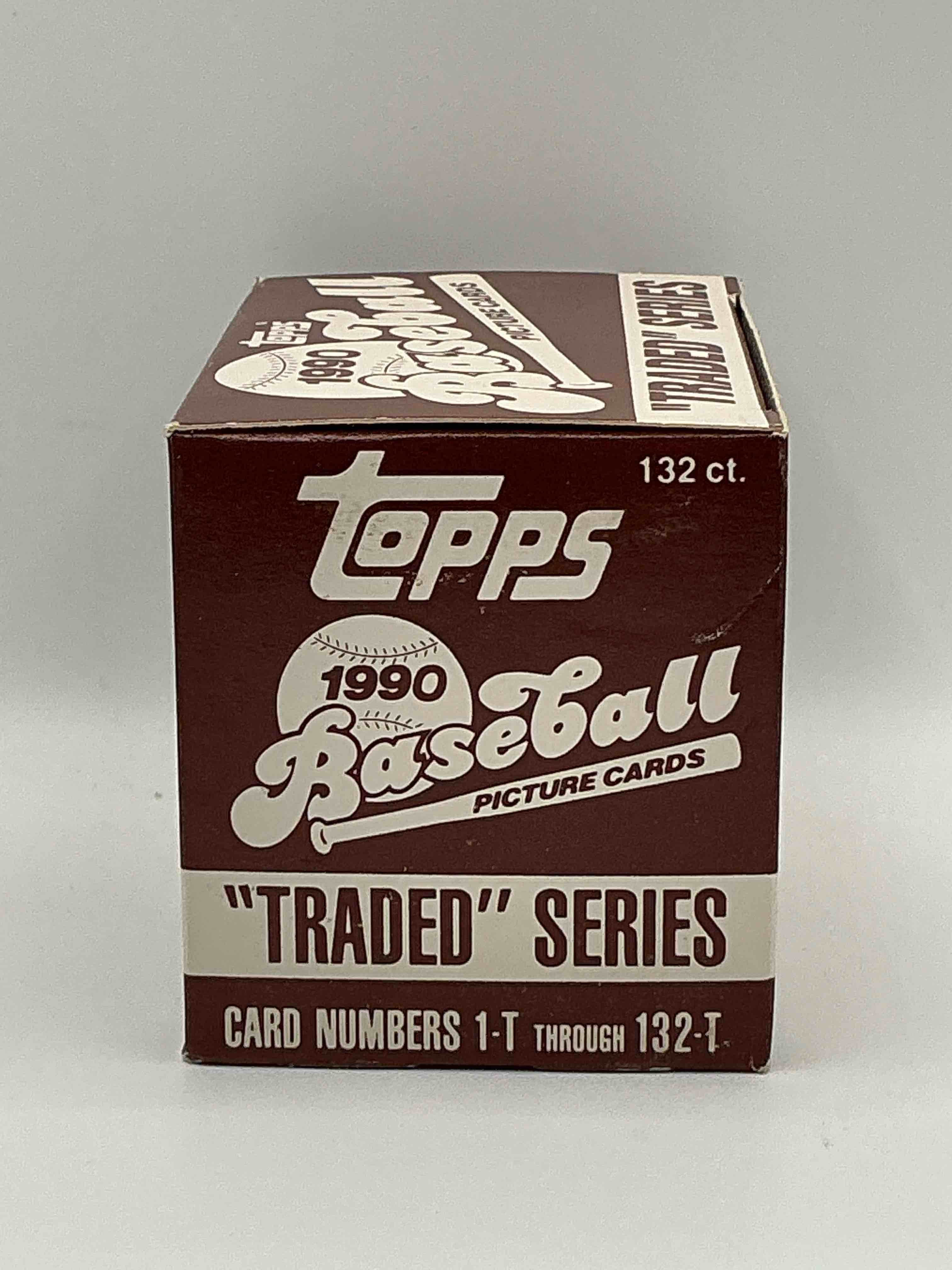 Condition photo showing New/Like New for 1990 Topps Baseball Card Complete Unopened Traded Series, Card Numbers 1-T Through 132-T. Set Is Unopened (These Sets Were Never Factory Sealed In Plastic From Manufacturer). Set Includes David Justice Traded Rookie. Great Sports Card Memorabilia!