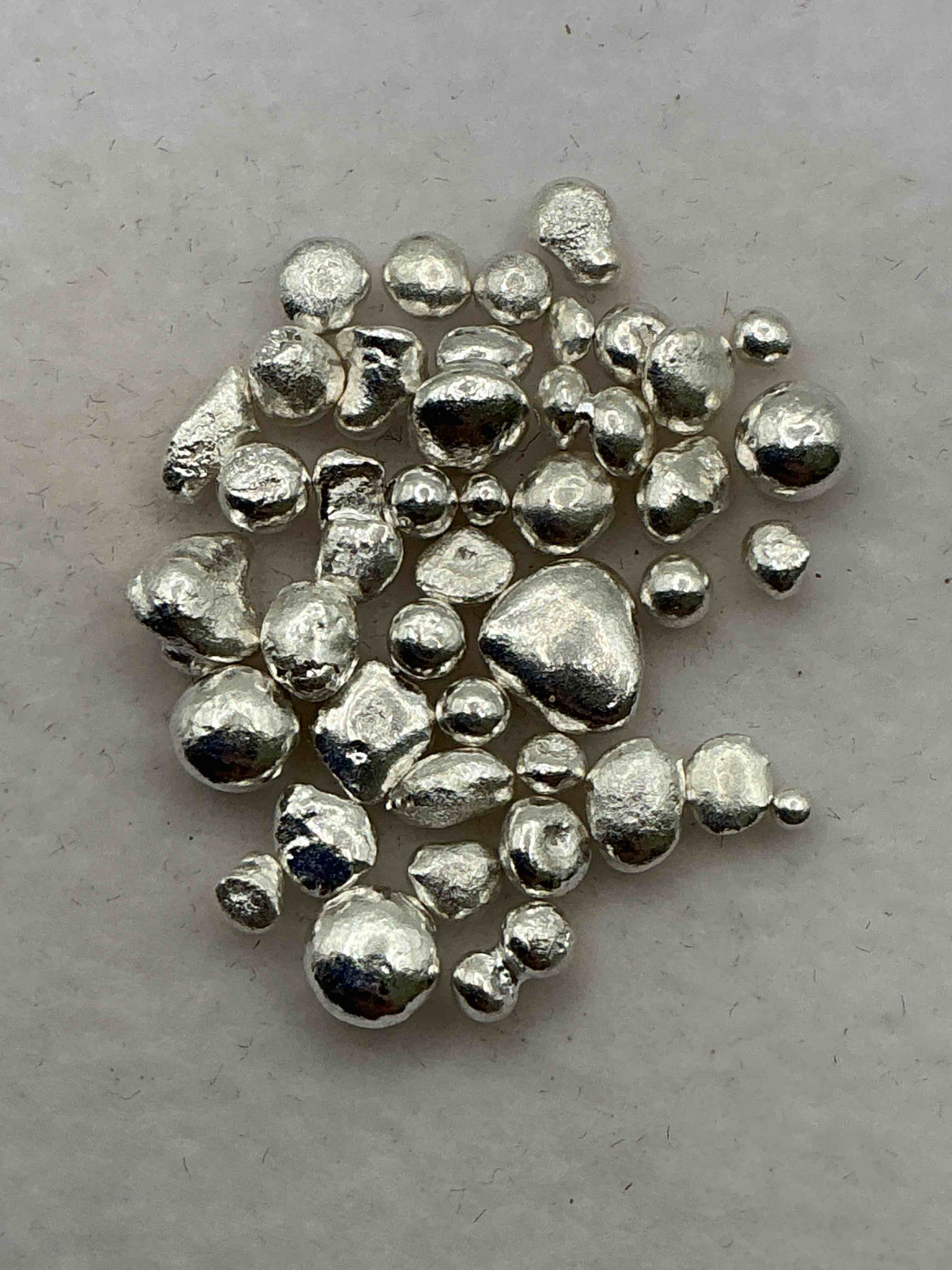 Condition photo showing New/Like New for Silver Nuggets! .999 US Fine Silver, In Small Nugget Form! Total Weight Of All Nuggets In Lot Approximately 6 Grams, Bid Is Per Nugget! A Cool Way To Invest In Fine US Silver! Includes Collector Capsule!