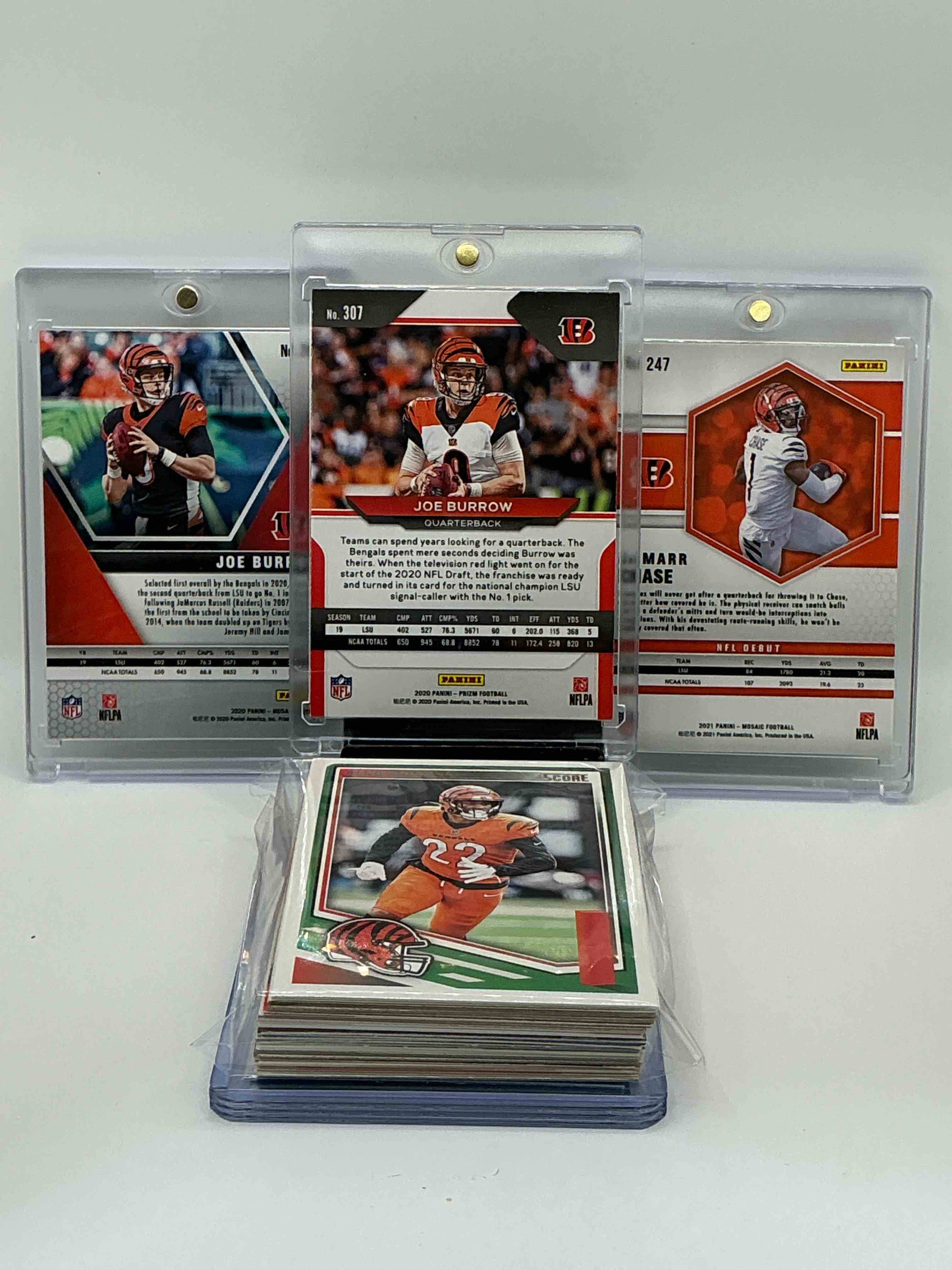 Condition photo showing New/Like New for Bengals Bonanza! 2020 Prizm Rookie Joe Burrow! 2020 Mosaic Rookie “NFL Debut” Joe Burrow! 2021 Mosaic Rookie “NFL Debut” Ja’marr Chase! Along With 35 Other Bengals Heroes, Legends & Commons!