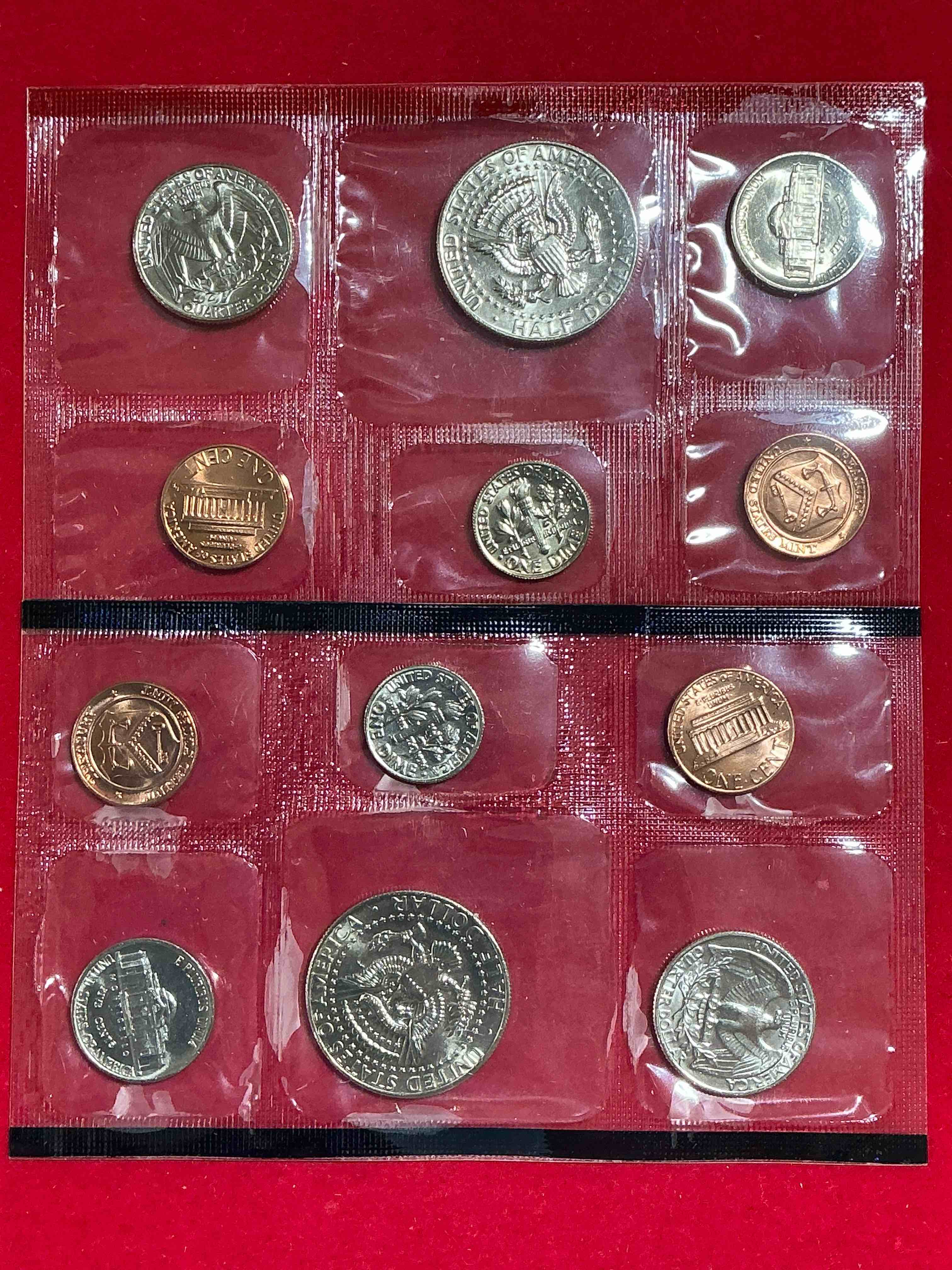 Condition photo showing New/Like New for 1985 Mint Set! 12 Coin Set Including Quarters,Kennedy Halves & Pennies! Highly Desirable For Collectors! Own These Crazy Pieces Of History!