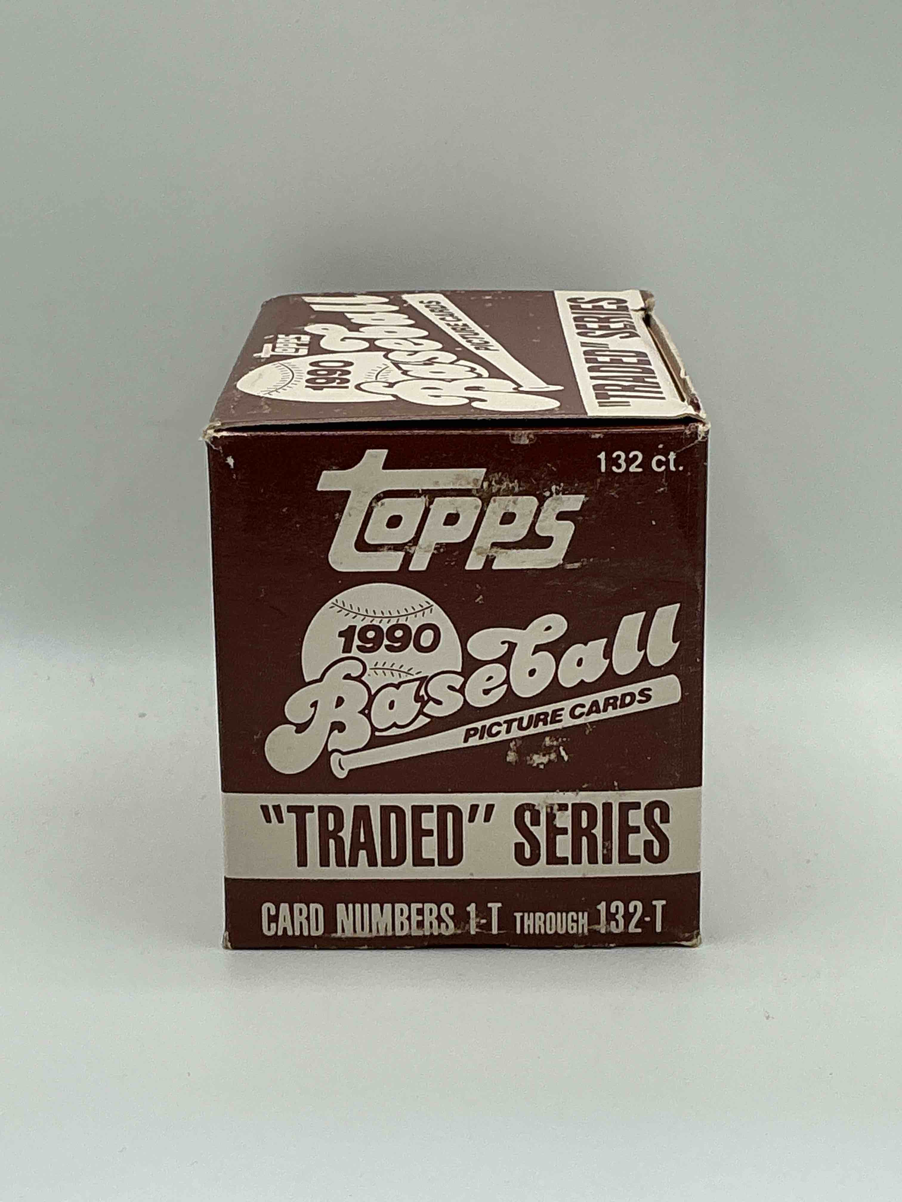 Condition photo showing New/Like New for 1990 Topps Baseball Card Complete Unopened Traded Series, Card Numbers 1-T Through 132-T. Set Is Unopened (These Sets Were Never Factory Sealed In Plastic From Manufacturer). Set Includes David Justice Traded Rookie. Great Sports Card Memorabilia!