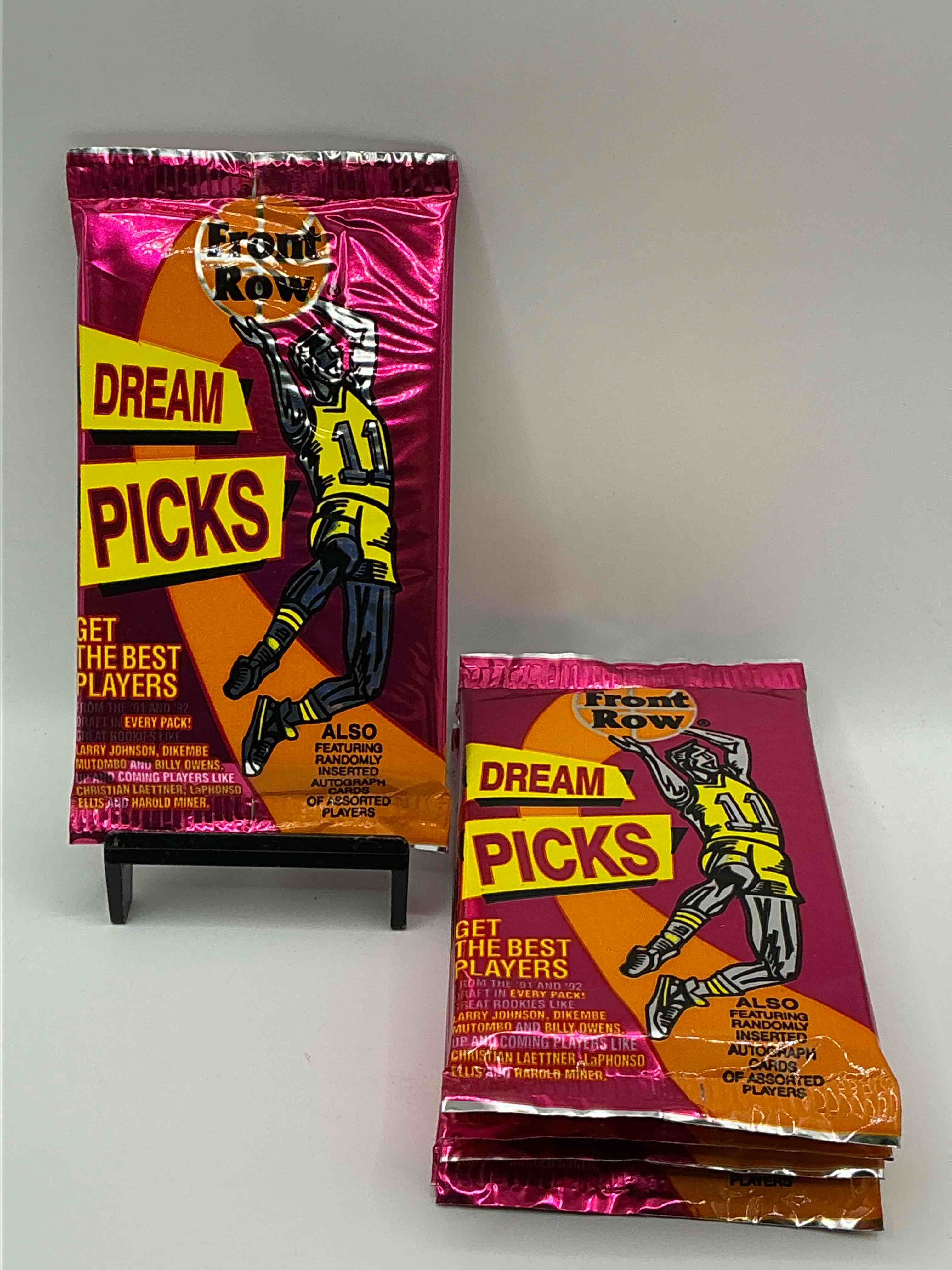 1991 Throwback Rarity! Here's Something You've Probably NEVER Seen! 1991 Front Row College Basketball / NBA Unopened Sealed Packs, Direct From Sealed Original Retail Case! Includes Randomly Inserted Rare Autograph Cards! Front Row Was The “Original" College Jersey Card Packs Back In The Day & Has Long Been Defunct. These Cards Are Becoming Serious Collector Items Due To Their Scarcity. These Things Are Serious Rare! Own Some Great Sports Card History & Something You'll Rarely See Again!