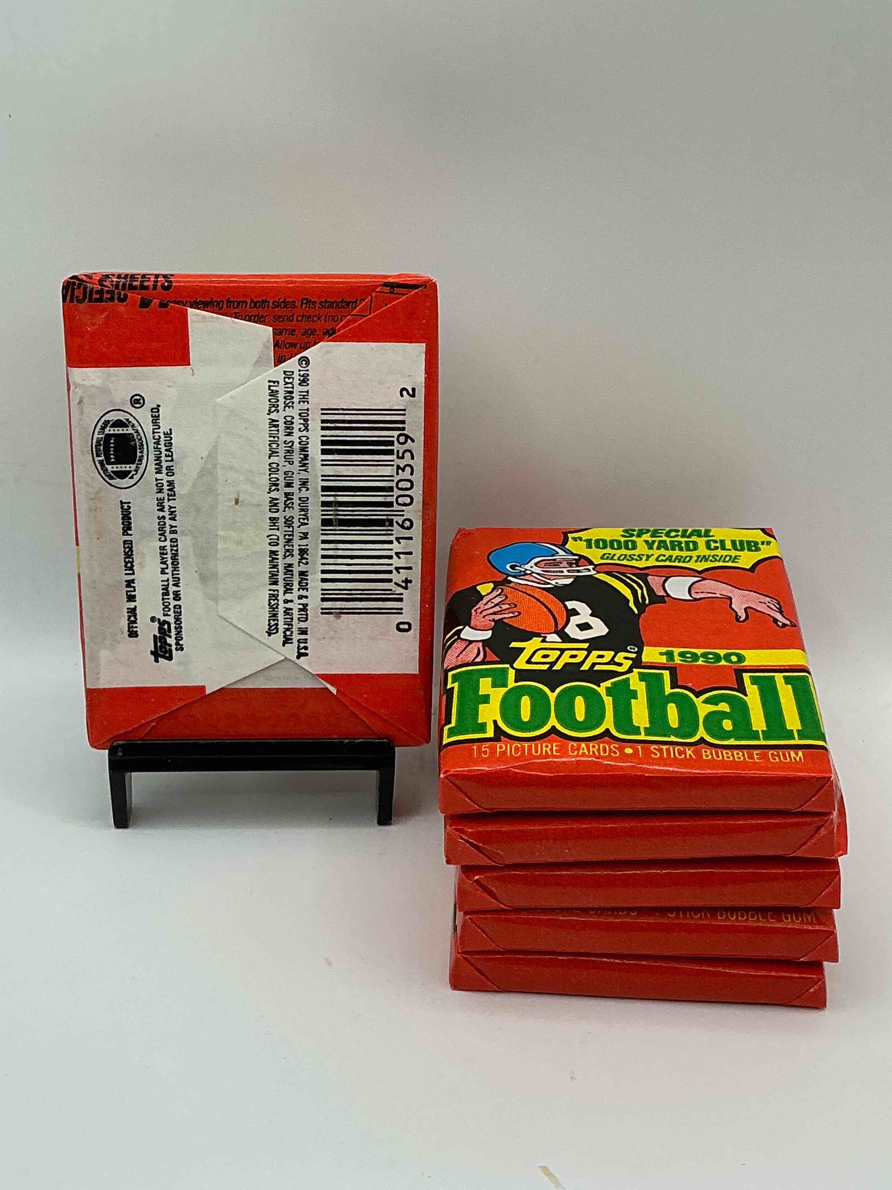 Condition photo showing New/Like New for The Last Year Of Football Wax! Joe Montana, Emmitt Smith & Barry Sanders!? 1990 Topps Football Unopened Sports Card Wax Pack, Direct From Original Retail Box! Getting Hard To Find! Search For Early Barry Sanders & Jerry Rice & So Much More!