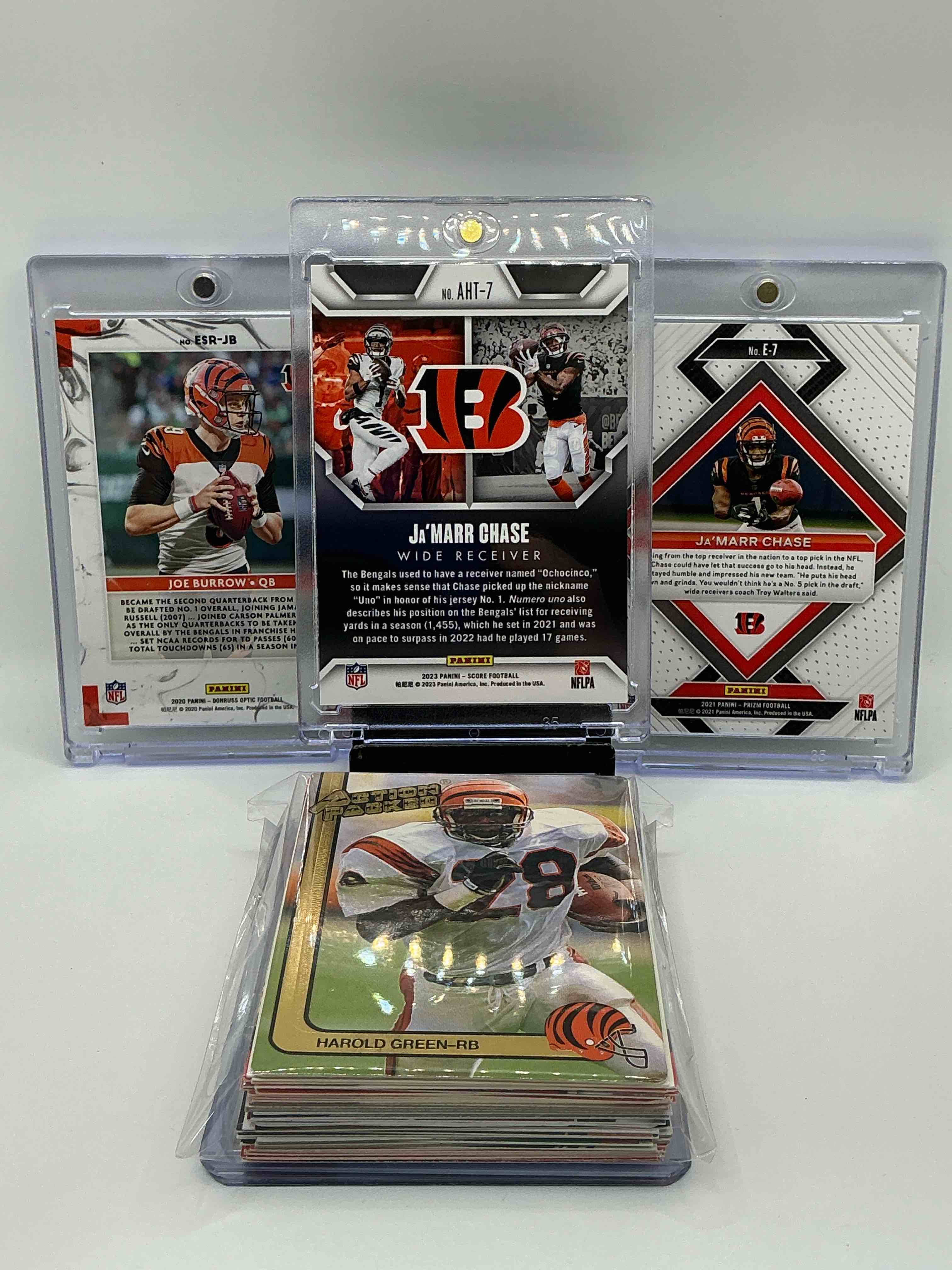 Condition photo showing New/Like New for Bengals Bonanza! 2023 Score Holographic “All Hands Team” Case Hit Ja’marr Chase! Super Rare- Only 1 Per Case! 2020 Donruss Optic Elite Series Rookies Marble Rookie Joe Burrow! 2021 Prizm Emergent Rookie Ja’marr Chase! Along With 35 Other Bengals Legends, Hereos & Commons!