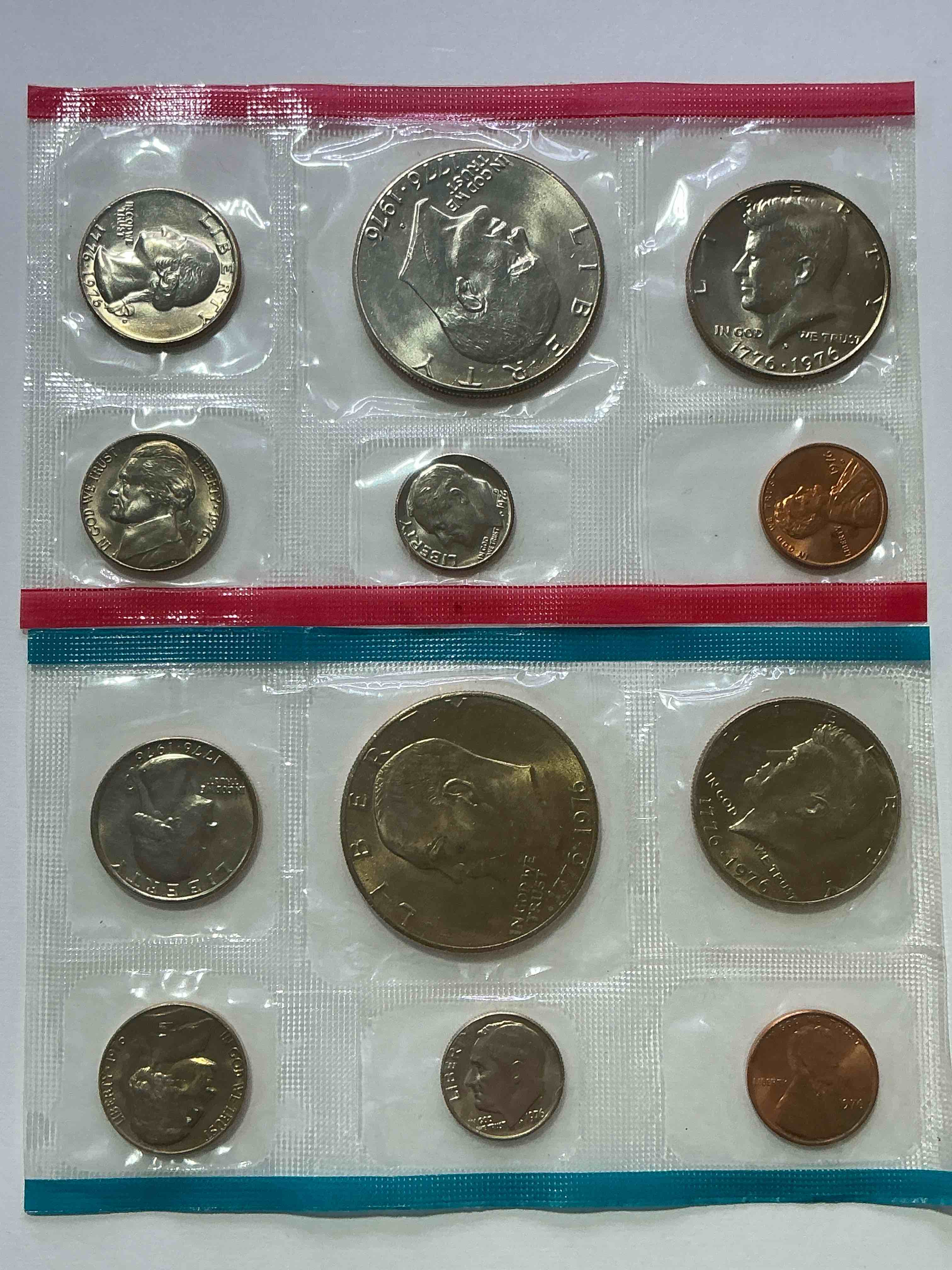 1976 Bicentennial Bliss! In 1976 The U.S. Mint Set Celebrating The 200 Year Anniversary Of America! 12 Coin Set Including Bicentennial Quarters, IKEs, Kennedy Halves & Pennies! Highly Desirable For Collectors! Own Pieces Of History & Celebrating America's 250 Year Anniversary Coming Soon!