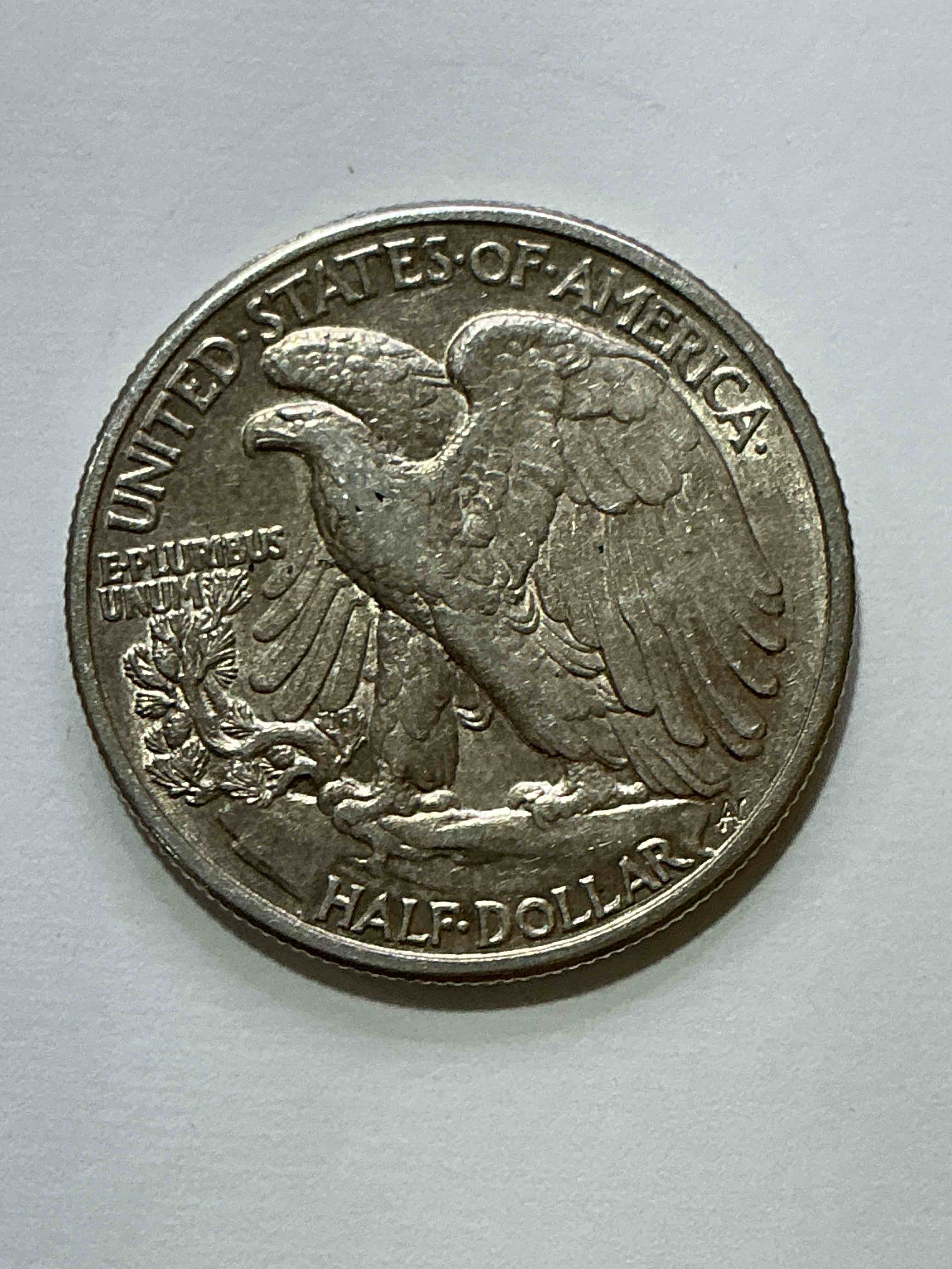 Condition photo showing Good Condition for World War II Era Silver! Antique U.S. Silver! Liberty Walking Silver Fine U.S. Silver Half Dollar! This Striking Half Dollars Were Minted From 1916-1947 & Have Become Some Of The Most Collectible Coins In History! Here Is A Striking Appears Uncirculated Example From 1945! Liberty Walking Coins Are 90% Fine U.S. Silver, A Great Investment In Precious Metal!