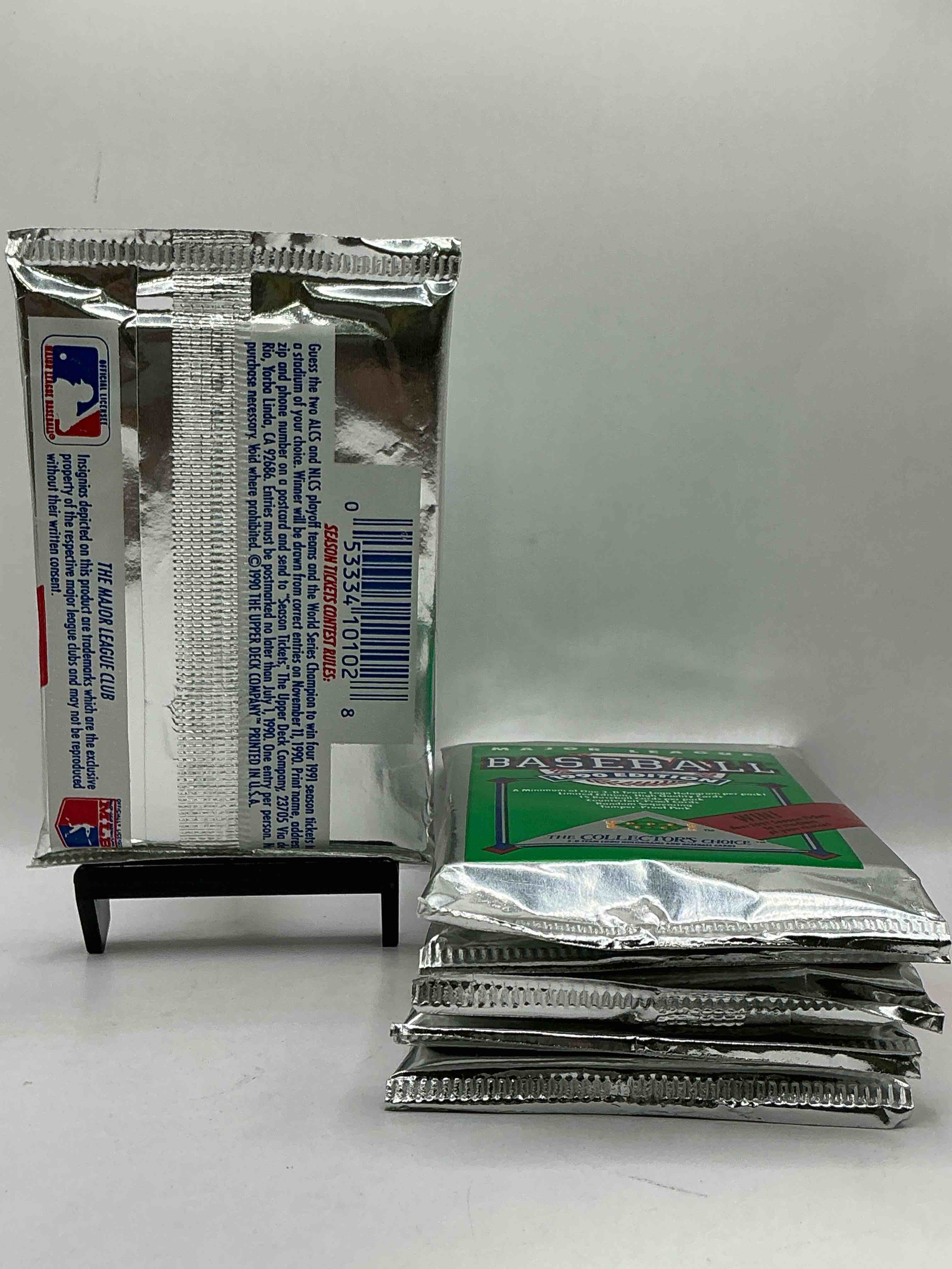 Condition photo showing New/Like New for 1990 Upper Deck Baseball Unopened Sports Trading Card Packs! Direct From Original Box! Look For Possible Collector's 3D Team Logo Card! As Well As Early Ken Griffey Jr. Cards!