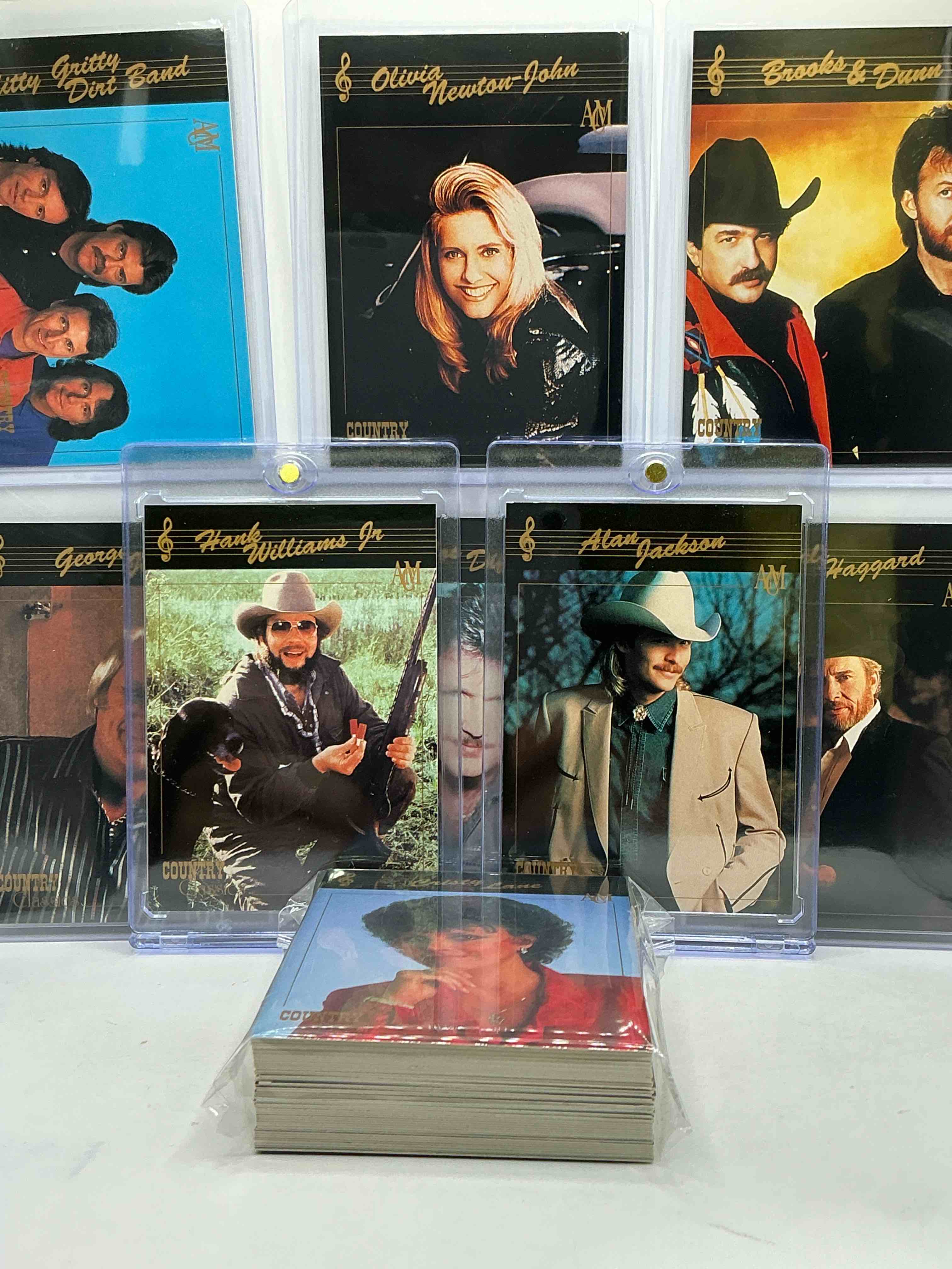 Condition photo showing New/Like New for Hank Williams Jr! Alan Jackson! NO WAY! Country Music Craziness! Olivia Newton John, George Jones, Nitty Gritty, Joe Diffe & More! Insane 50 Card Country Music Lot! 1992 Cards, Some Of The Biggest Names In The Country World! PERFECT For Vintage, Authentic & Real Country Fans! 