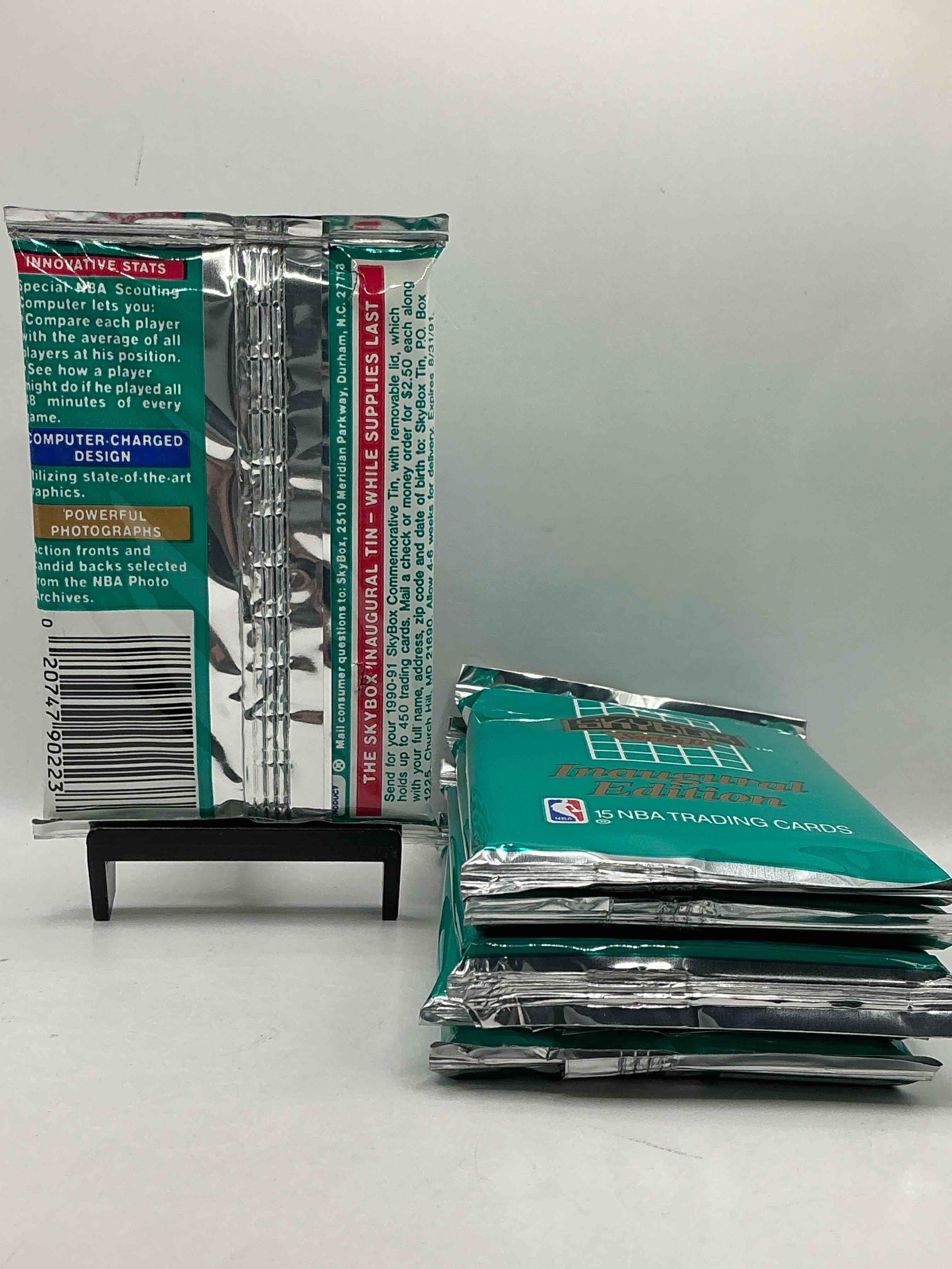Condition photo showing New/Like New for Michael Jordan, Magic Johnson & More! Search For So Many NBA Legends & Stars! 1990-91 Skybox Unopened Pocks! Direct From Original Box! These Packs Are Sought After For Ther Eye-Catching Teal Look & Awesome Cards! Search For Valuable Michael Jordan, Larry Bird & Magic Johnson Cards! Along With Other Stars!