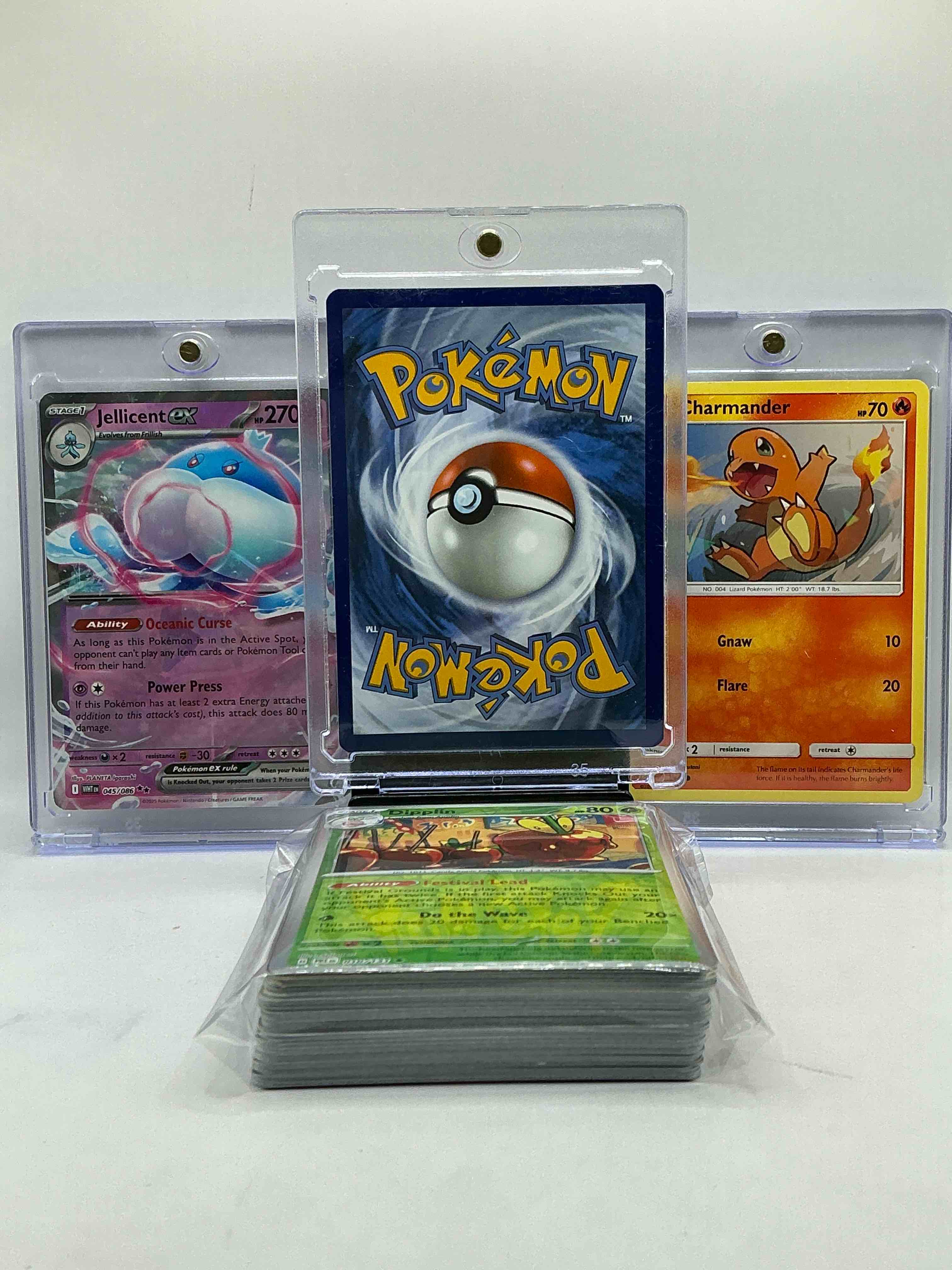 Condition photo showing New/Like New for Mega Charizard EX X Holo, Charmander & Jellicent EX Holo WOW! Insane Trio! This 50 Card Pokémon Lot Includes Commons, Legends, Heroes & More!