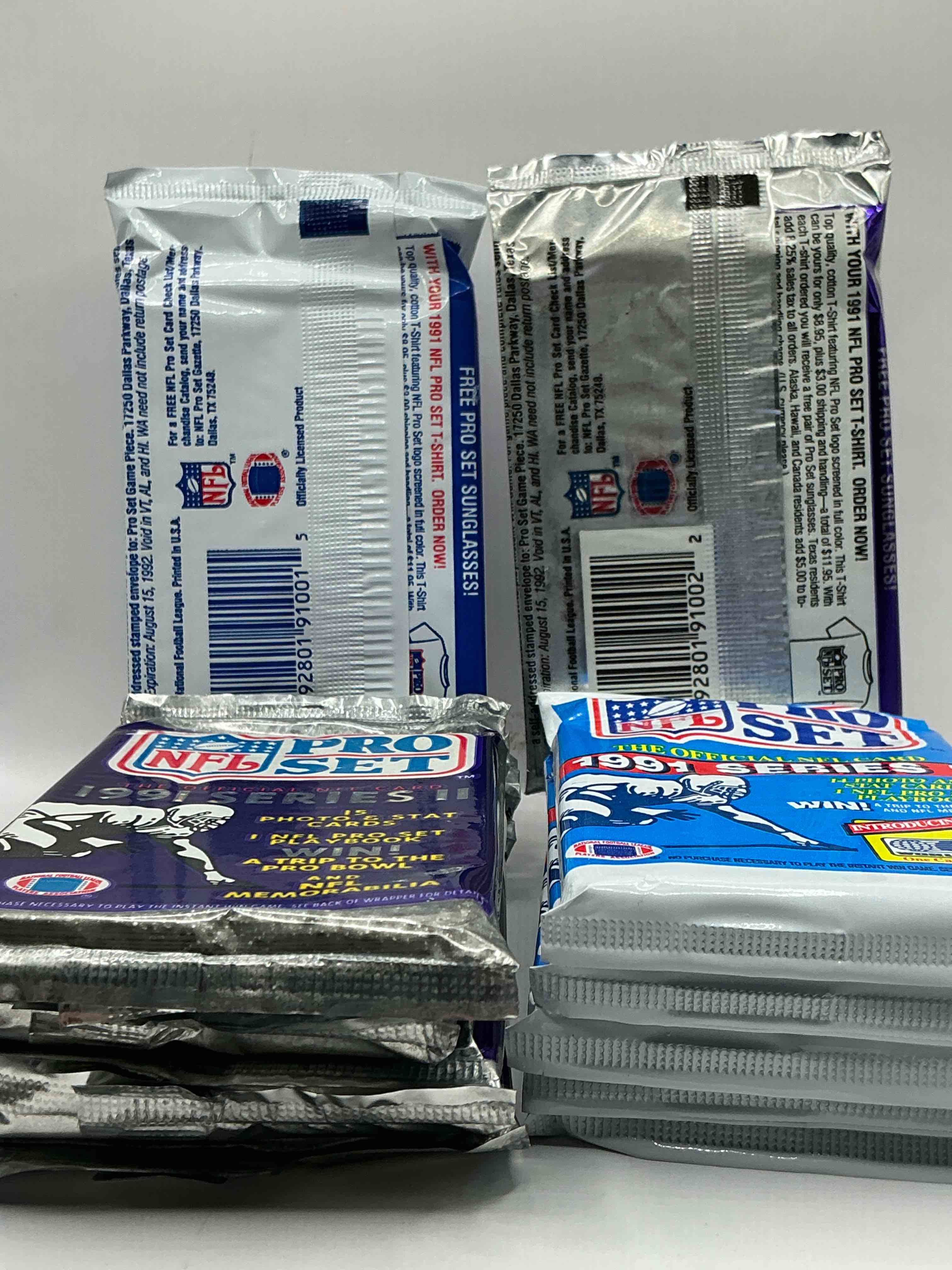 Condition photo showing New/Like New for Wow! 1991 Pro Set Football Sealed Card Packs Series I, Direct From Original Retail Case!Highly Sought After By Collectors As This Year Is Loaded With High Profile Cards!Search For Cards From Barry Sanders, Deion Sanders, Troy Aikman, Michael Irvin & Much More! Getting Hard To Find!